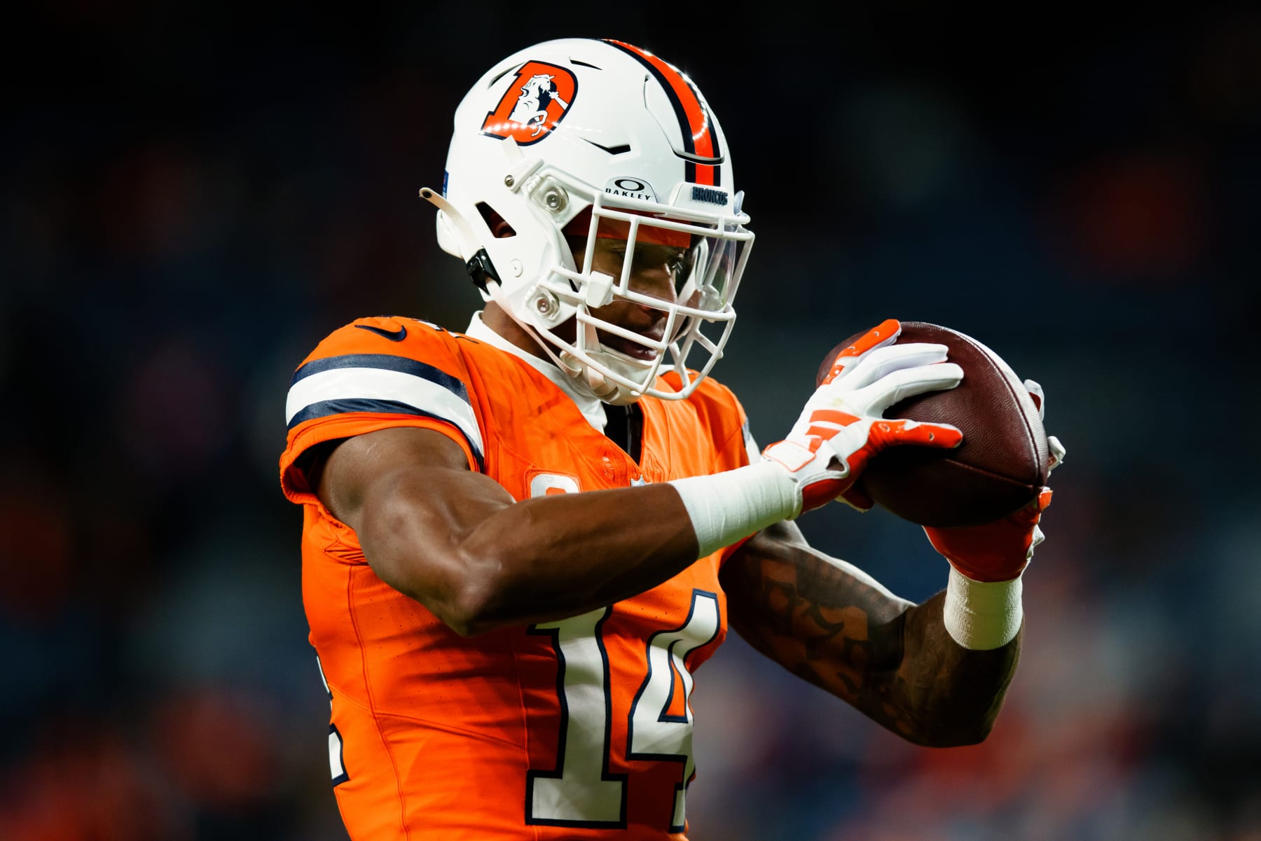 DENVER, CO - JANUARY 24: Wide receiver Courtland Sutton #14 of the Denver Broncos catches a pass on the field against the New England Patriots at Empower Field at Mile High on December 24, 2023 in Denver, Colorado. (Photo by Justin Edmonds/Getty Images)