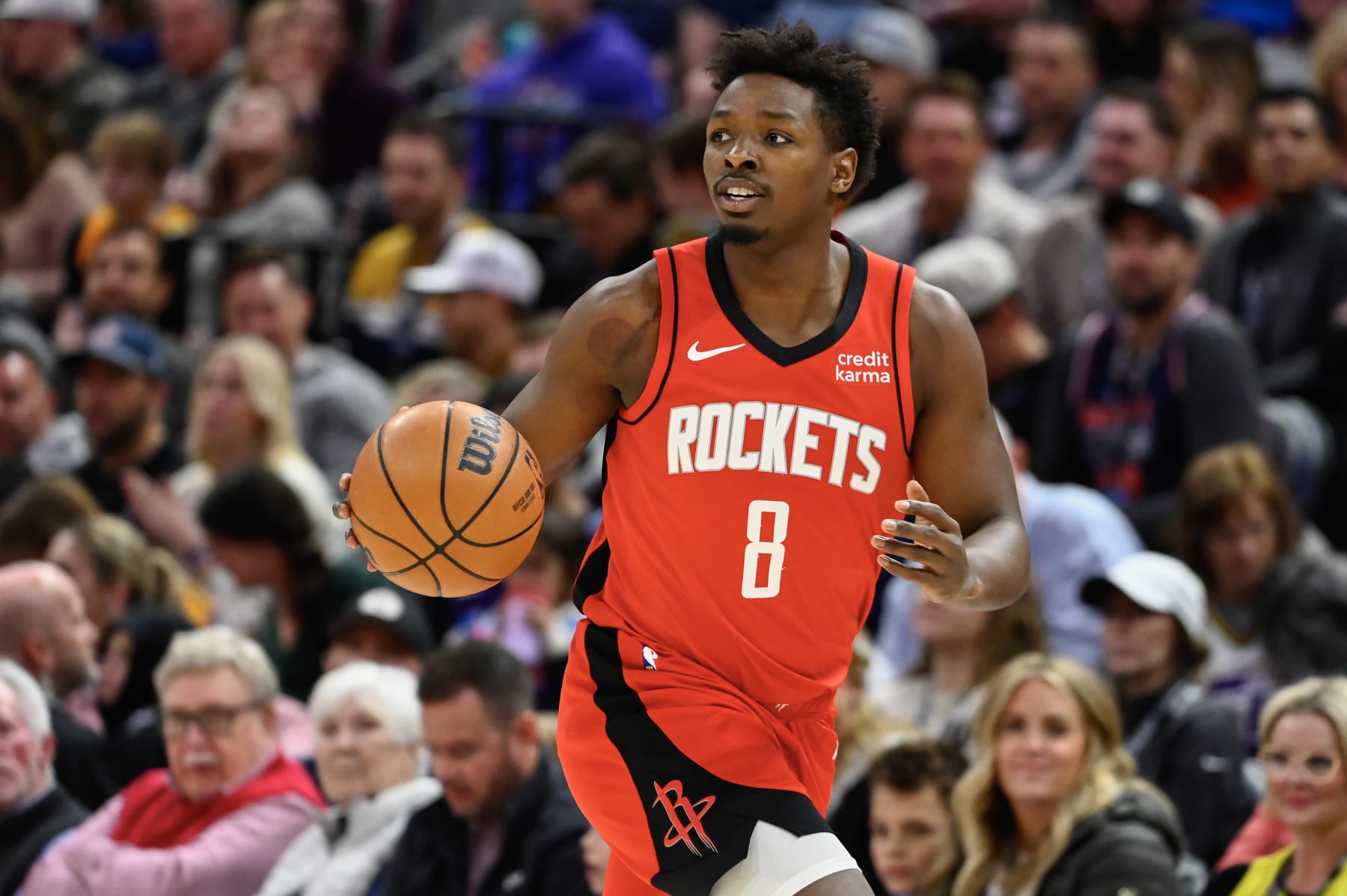 SALT LAKE CITY, UTAH - MARCH 29: Jae'Sean Tate #8 of the Houston Rockets dribbles during the first half of a game against the Utah Jazz at Delta Center on March 29, 2024 in Salt Lake City, Utah. NOTE TO USER: User expressly acknowledges and agrees that, by downloading and or using this photograph, User is consenting to the terms and conditions of the Getty Images License Agreement. (Photo by Alex Goodlett/Getty Images)