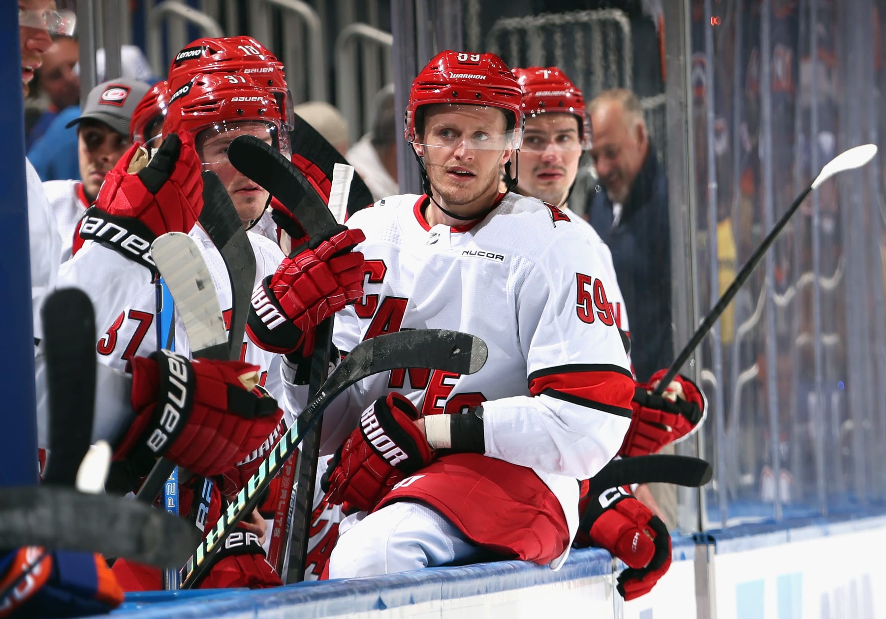 ELMONT, NEW YORK - APRIL 25: Jake Guentzel #59 of the Carolina Hurricanes watches the closing seconds of the first period against the New York Islanders in Game Three of the First Round of the 2024 Stanley Cup Playoffs at UBS Arena on April 25, 2024 in Elmont, New York. (Photo by Bruce Bennett/Getty Images)