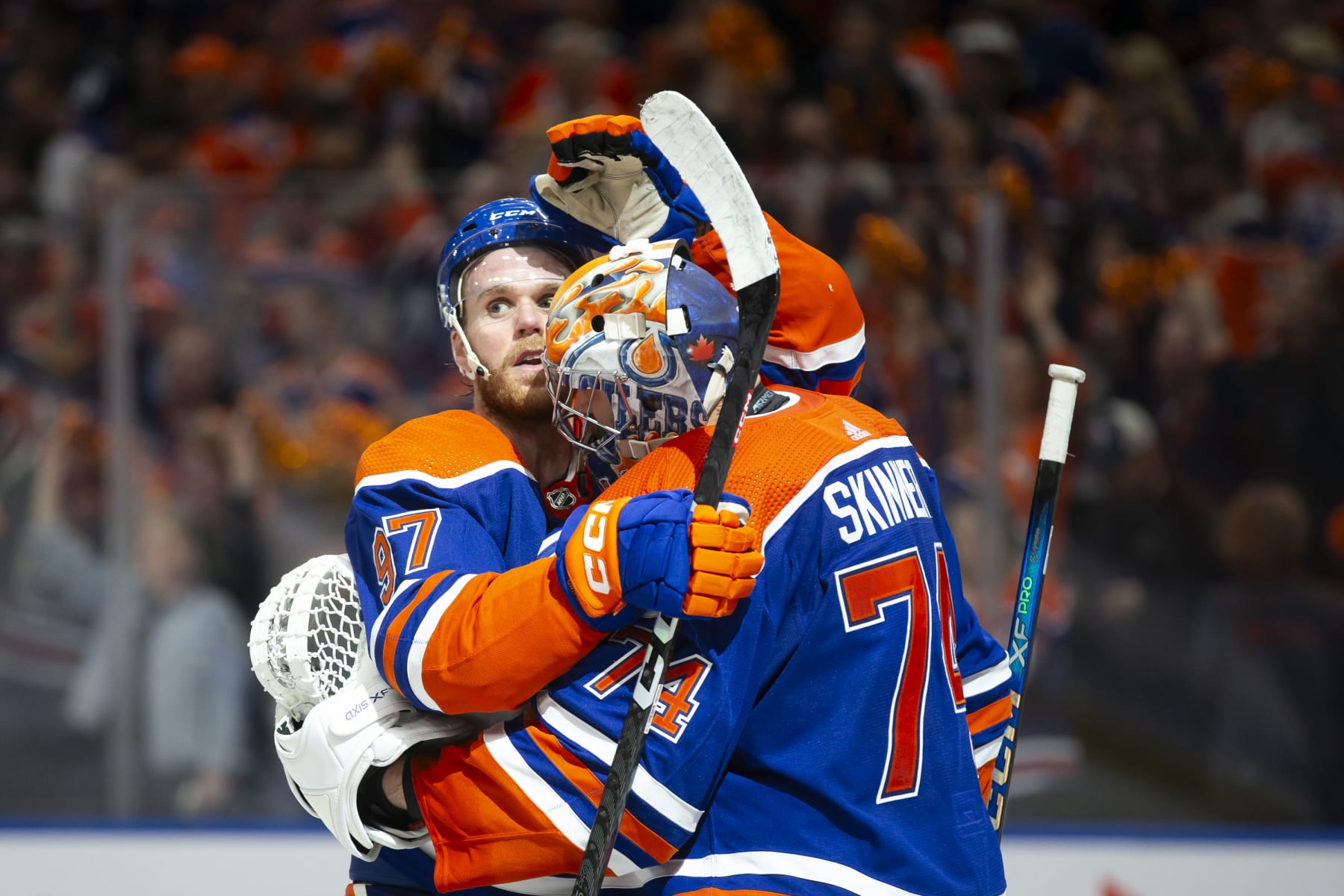EDMONTON, CANADA - MAY 1: Connor McDavid #97 and goaltender Stuart Skinner #74 of the Edmonton Oilers celebrate a 4-3 victory against of the Los Angeles Kings during the third period in Game Five of the First Round of the 2024 Stanley Cup Playoffs at Rogers Place on May 1, 2024, in Edmonton, Canada. (Photo by Codie McLachlan/Getty Images)