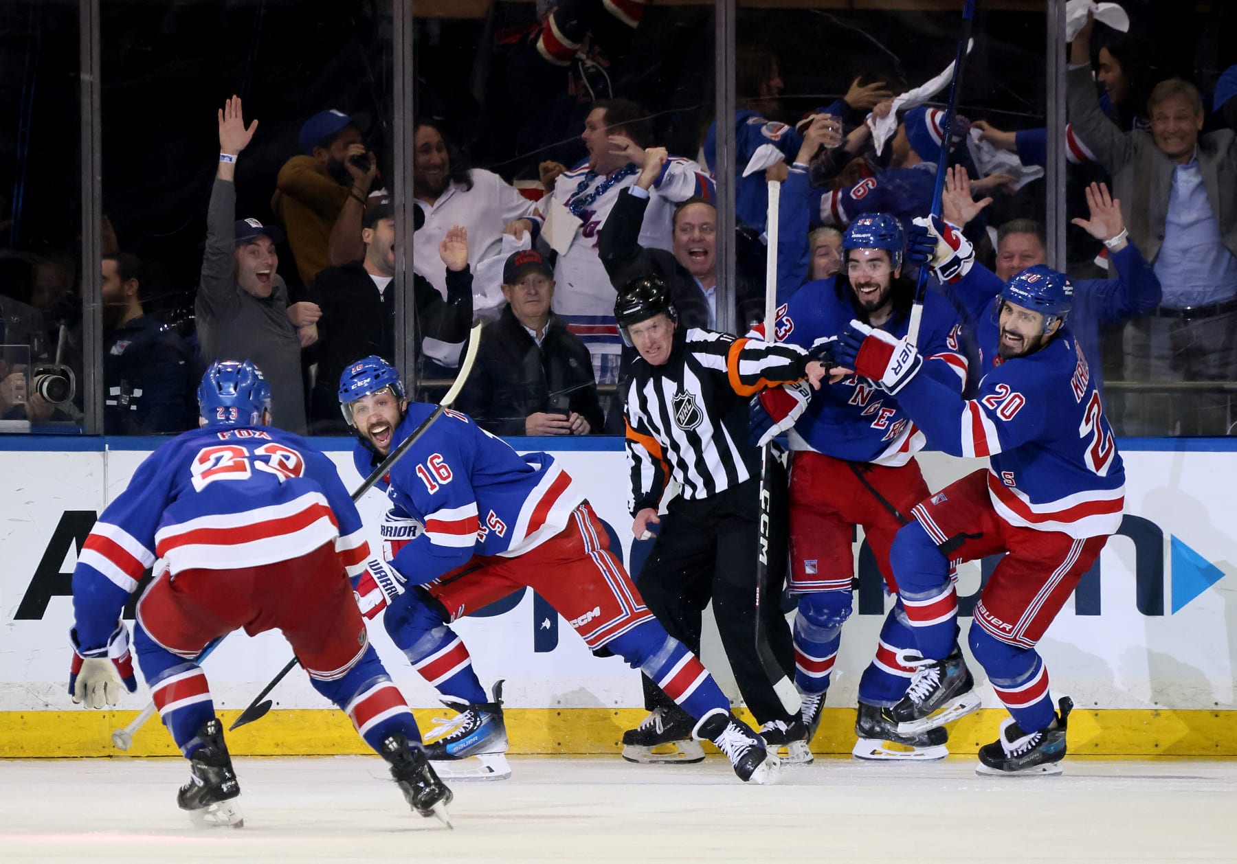 NEW YORK, NEW YORK - MAY 07: Vincent Trocheck #16 of the New York Rangers celebrates with teammates after scoring the winning goal in the second overtime against the Carolina Hurricanes in Game Two of the Second Round of the 2024 Stanley Cup Playoffs at Madison Square Garden on May 07, 2024 in New York City. (Photo by Bruce Bennett/Getty Images)