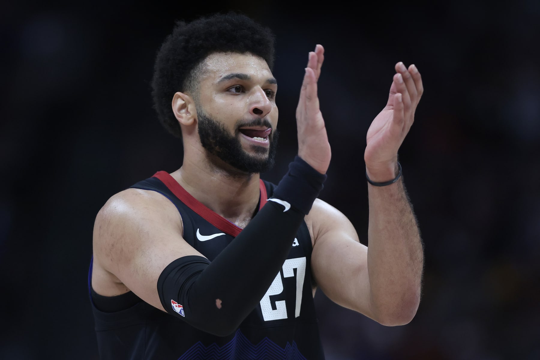 DENVER, COLORADO - MAY 06: Jamal Murray #27 of the Denver Nuggets celebrates a foul being called on the Minnesota Timberwolves in the second quarter during Game Two of the Western Conference Second Round Playoffs at Ball Arena on May 06, 2024 in Denver, Colorado. NOTE TO USER: User expressly acknowledges and agrees that, by downloading and or using this photograph, User is consenting to the terms and conditions of the Getty Images License Agreement. (Photo by Matthew Stockman/Getty Images)