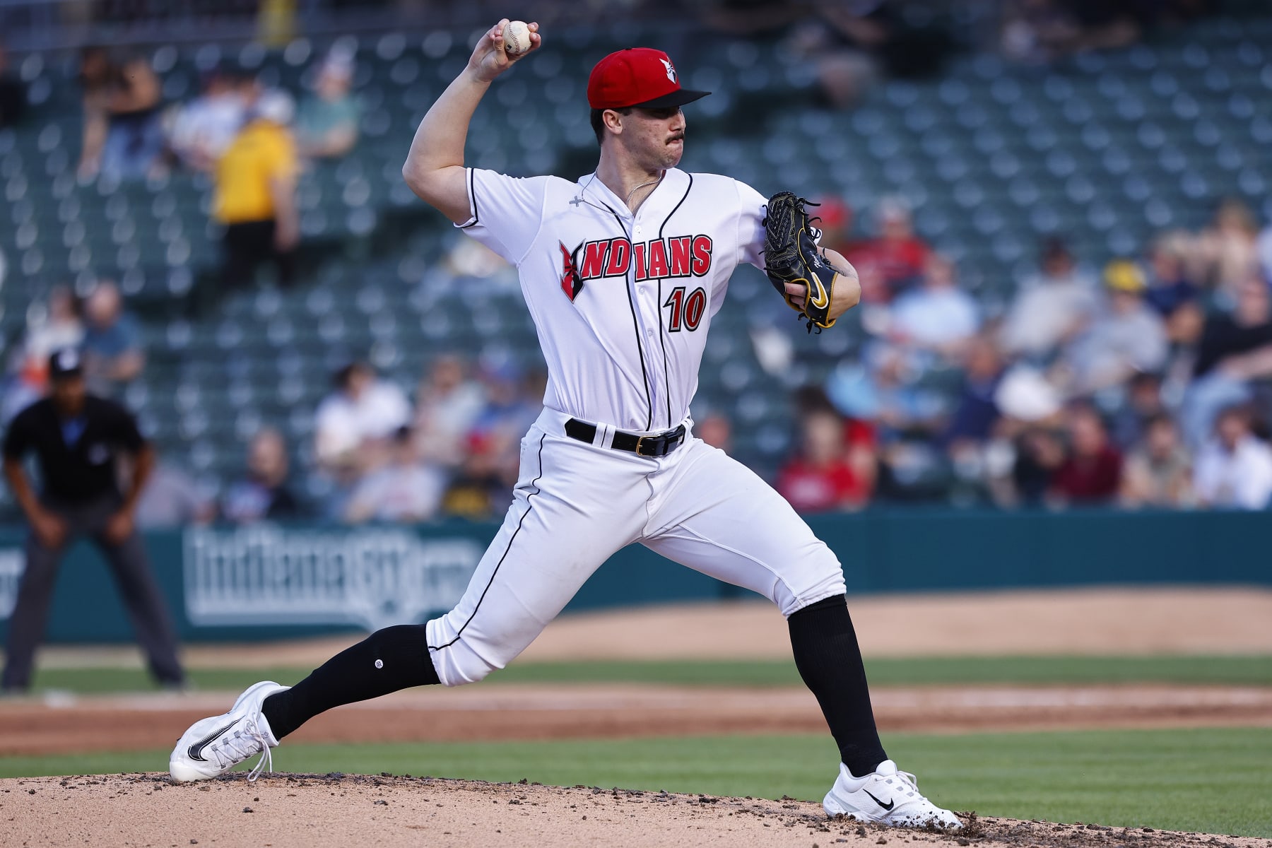 INDIANAPOLIS, IN - APRIL 30: The number one draft pick out of LSU Indianapolis Indians pitcher Paul Skenes (10) brings the pitch to the plate during a Milb baseball game between the Buffalo Bisons and the Indianapolis Indians on April, 30, 2024 at Victory Field in Indianapolis, IN.(Photo by Jeffrey Brown/Icon Sportswire via Getty Images)