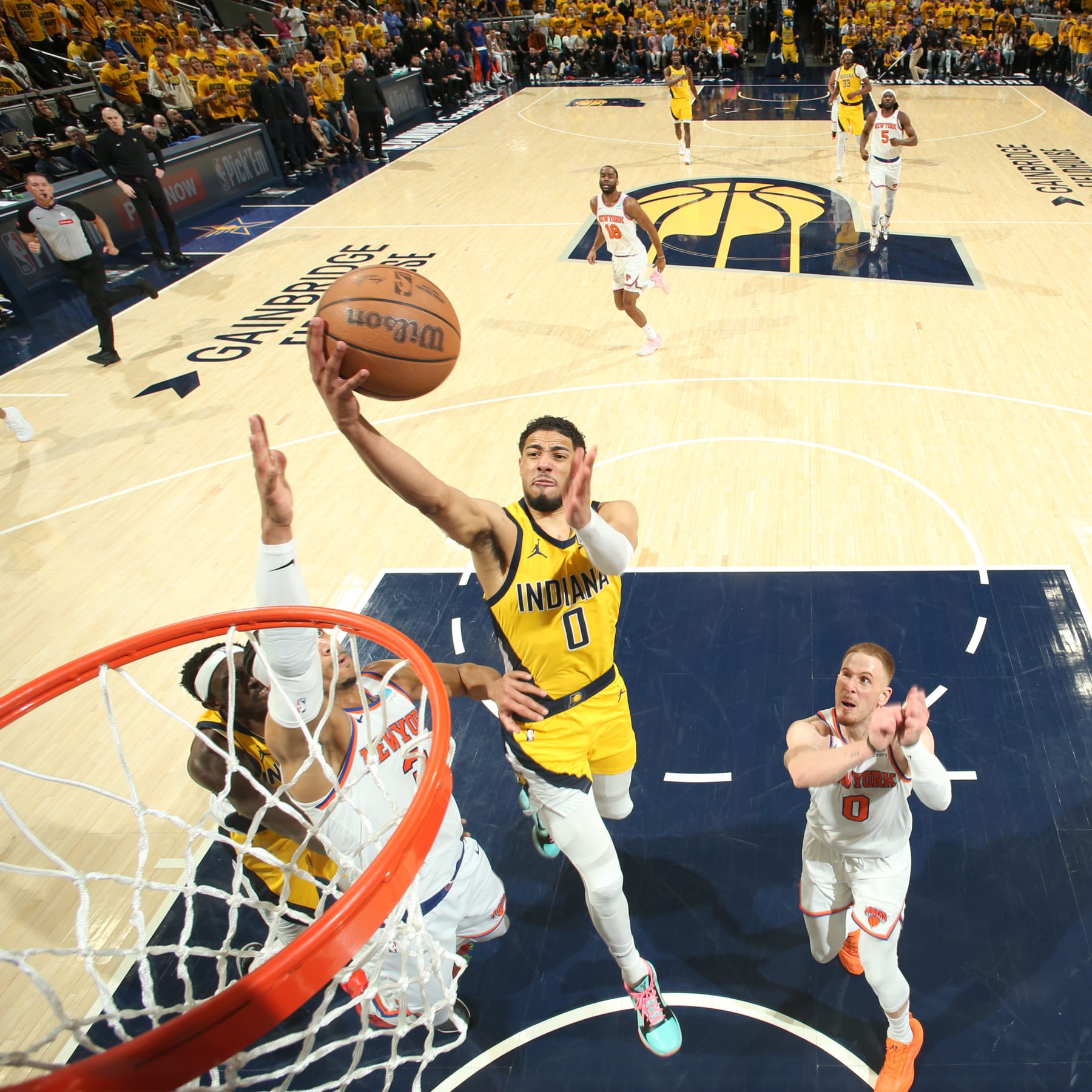 INDIANAPOLIS, IN - MAY 10: Tyrese Haliburton #0 of the Indiana Pacers drives to the basket during the game  against the New York Knicks during Round 2 Game 3 of the 2024 NBA Playoffs on May 10, 2024 at Gainbridge Fieldhouse in Indianapolis, Indiana. NOTE TO USER: User expressly acknowledges and agrees that, by downloading and or using this Photograph, user is consenting to the terms and conditions of the Getty Images License Agreement. Mandatory Copyright Notice: Copyright 2024 NBAE (Photo by Nathaniel S. Butler/NBAE via Getty Images)