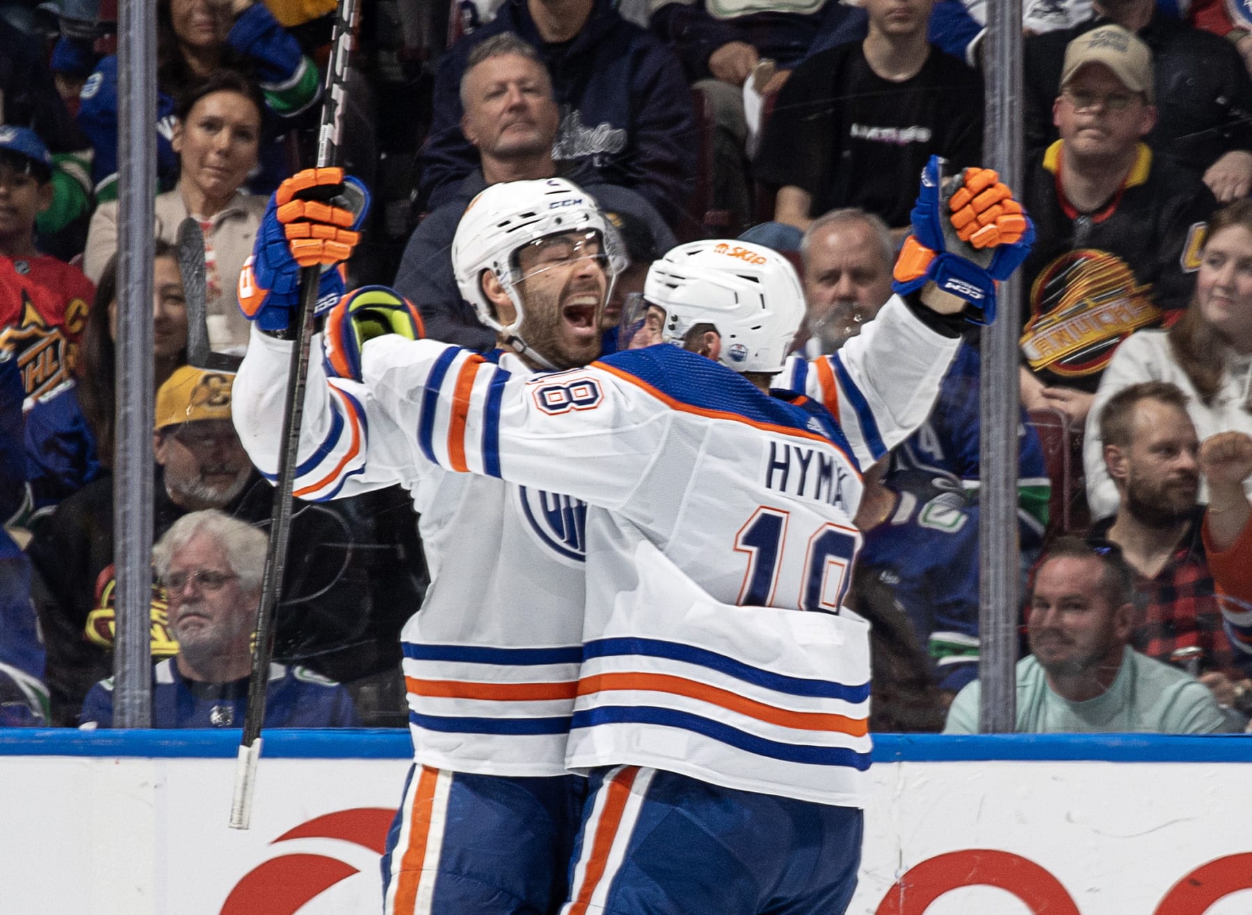 VANCOUVER, CANADA - MAY 10: Evan Bouchard #2 of the Edmonton Oilers celebrates his game winning goal during overtime in Game Two of the Second Round of the 2024 Stanley Cup Playoffs against the Vancouver Canucks at Rogers Arena on May 10, 2024 in Vancouver, British Columbia, Canada.  (Photo by Jeff Vinnick/NHLI via Getty Images)