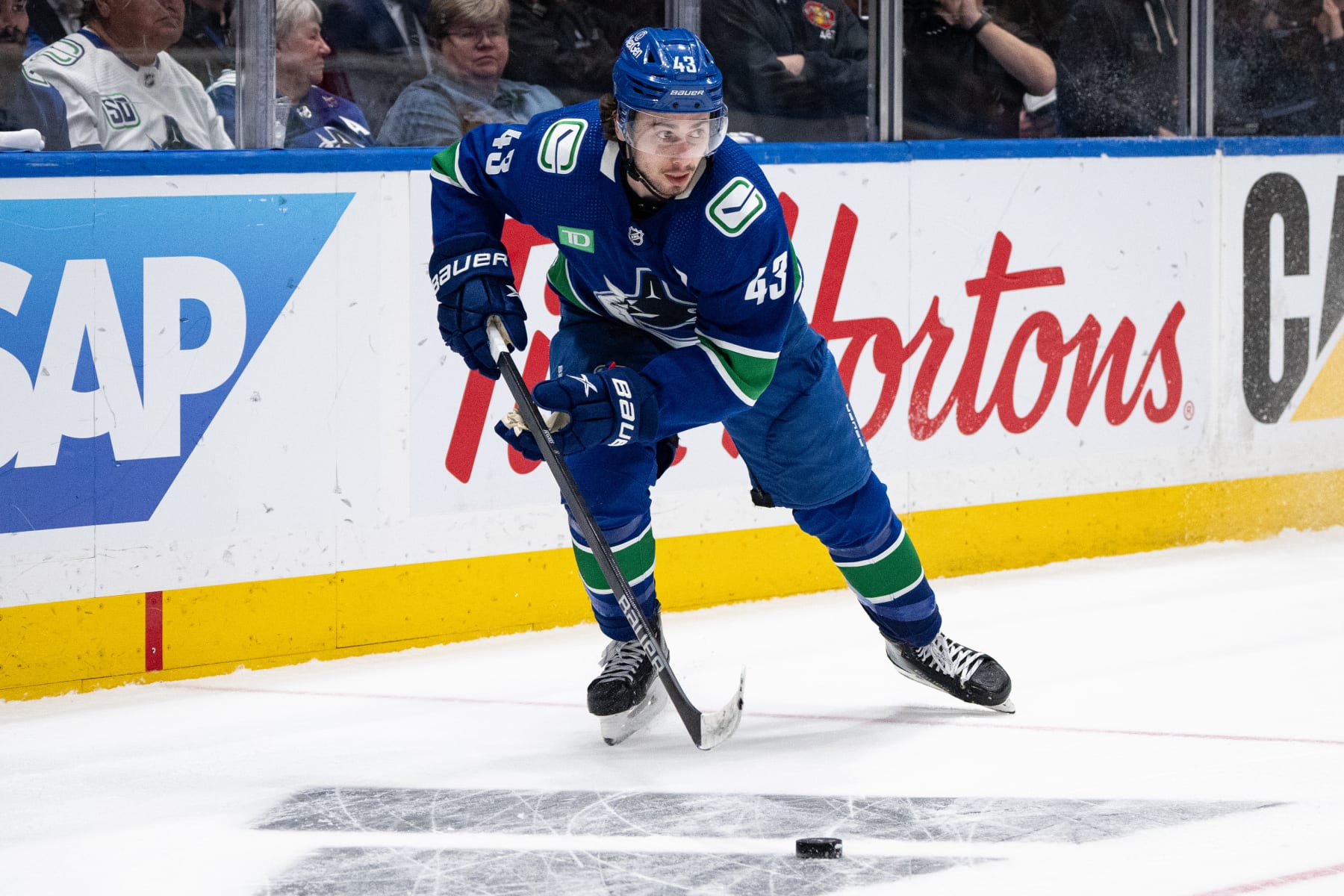 VANCOUVER, BC - APRIL 30: Vancouver Canucks defenseman Quinn Hughes (43) skates with the puck during Game Five of the First Round of the 2024 Stanley Cup playoffs between the Nashville Predators and the Vancouver Canucks on April 30, 2024, at Rogers Arena in Vancouver, B.C. (Photo by Ethan Cairns/Icon Sportswire via Getty Images)