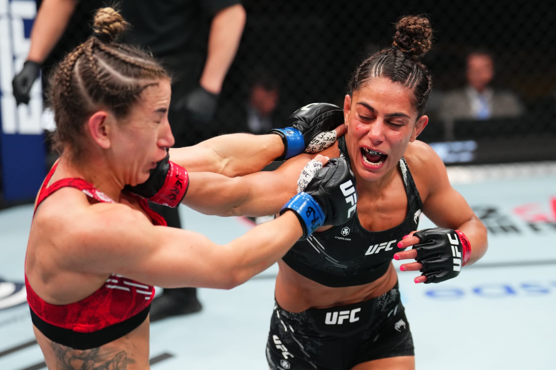 ST LOUIS, MISSOURI - MAY 11: (R-L) Tabatha Ricci of Brazil punches Tecia Pennington in a strawweight fight during the UFC Fight Night event at Enterprise Center on May 11, 2024 in St Louis, Missouri. (Photo by Josh Hedges/Zuffa LLC via Getty Images)