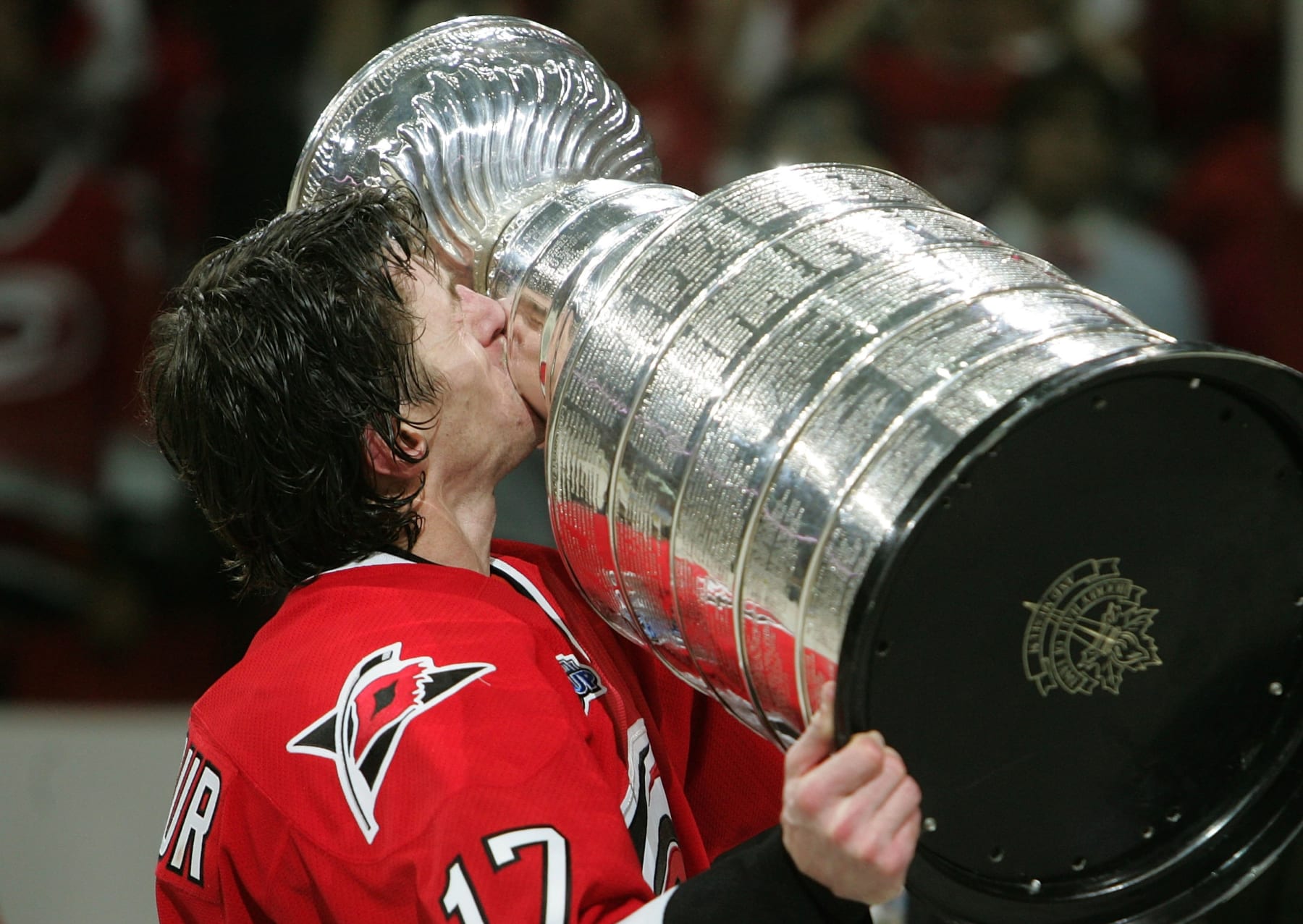 RALEIGH, NC - JUNE 19: Rod Brind'Amour #17 of the Carolina Hurricanes kisses the Stanley Cup after defeating the Edmonton Oilers in game seven of the 2006 NHL Stanley Cup Finals on June 19, 2006 at the RBC Center in Raleigh, North Carolina. The Hurricanes defeated the Oilers 3-1 to win the Stanley Cup finals 4 games to 3. (Photo by Jim McIsaac/Getty Images)