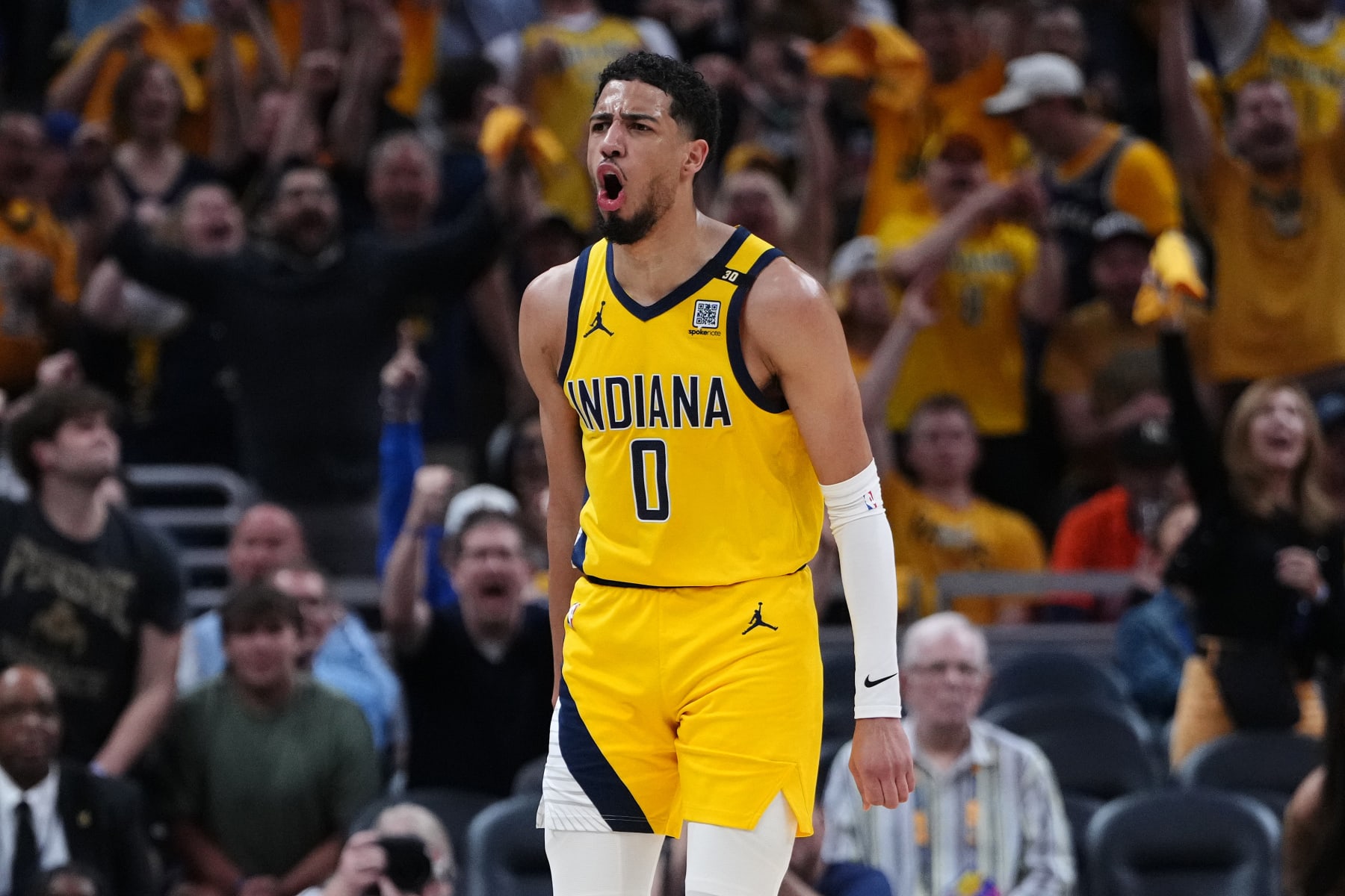 INDIANAPOLIS, INDIANA - MAY 12: Tyrese Haliburton #0 of the Indiana Pacers reacts after a three point basket against the New York Knicks in Game Four of the Eastern Conference Second Round Playoffs at Gainbridge Fieldhouse on May 12, 2024 in Indianapolis, Indiana. NOTE TO USER: User expressly acknowledges and agrees that, by downloading and or using this photograph, User is consenting to the terms and conditions of the Getty Images License Agreement. (Photo by Dylan Buell/Getty Images)