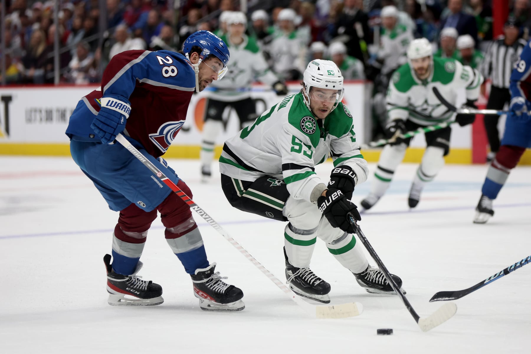DENVER, COLORADO - MAY 13: Wyatt Johnston #53 of the Dallas Stars skates against Miles Wood #28 of the Colorado Avalanche during the first period in Game Four of the Second Round of the 2024 Stanley Cup Playoffs at Ball Arena on May 13, 2024 in Denver, Colorado. (Photo by Matthew Stockman/Getty Images)
