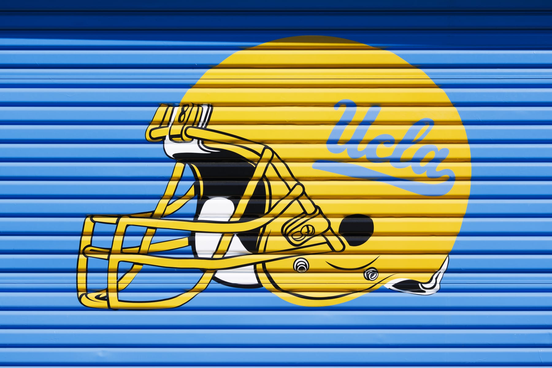 LOS ANGELES, CALIFORNIA - MARCH 15: A detail view of an UCLA Bruins helmet logo at Spaulding Field at the Wasserman Football Center on March 15, 2024 in Los Angeles, California. (Photo by Ric Tapia/Getty Images)
