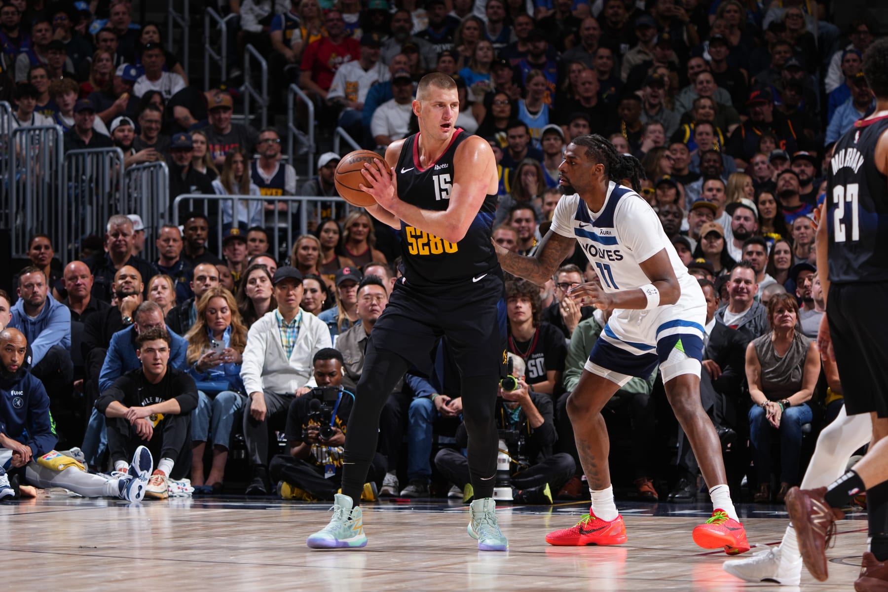 DENVER, CO - MAY 14: Nikola Jokic #15 of the Denver Nuggets handles the ball during the game against the Minnesota Timberwolves during Round 2 Game 5 of the of the 2024 NBA Playoffs on May 14, 2024 at the Ball Arena in Denver, Colorado. NOTE TO USER: User expressly acknowledges and agrees that, by downloading and/or using this Photograph, user is consenting to the terms and conditions of the Getty Images License Agreement. Mandatory Copyright Notice: Copyright 2024 NBAE (Photo by Garrett Ellwood/NBAE via Getty Images)