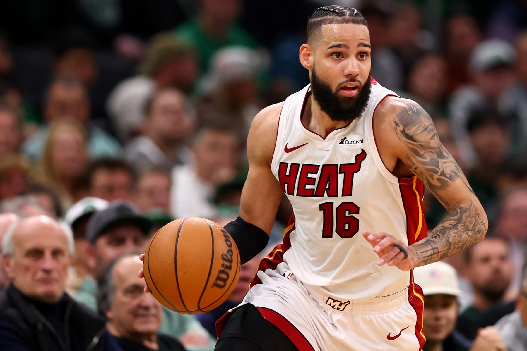 BOSTON, MASSACHUSETTS - MAY 01: Caleb Martin #16 of the Miami Heat dribbles against the Boston Celtics during the second quarter of game five of the Eastern Conference First Round Playoffs at TD Garden on May 01, 2024 in Boston, Massachusetts. NOTE TO USER: User expressly acknowledges and agrees that, by downloading and/or using this Photograph, user is consenting to the terms and conditions of the Getty Images License Agreement. (Photo by Maddie Meyer/Getty Images)