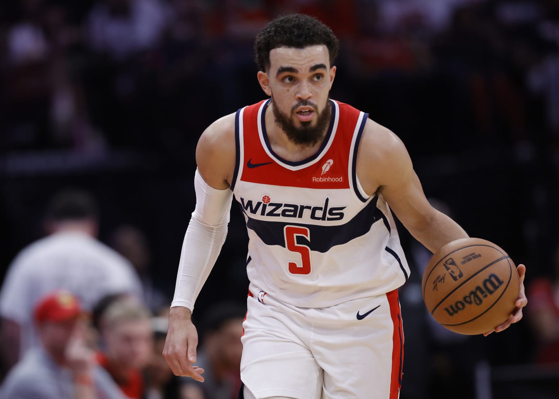 HOUSTON, TEXAS - MARCH 14: Tyus Jones #5 of the Washington Wizards in action against the Houston Rockets during the first half at Toyota Center on March 14, 2024 in Houston, Texas. NOTE TO USER: User expressly acknowledges and agrees that, by downloading and or using this photograph, User is consenting to the terms and conditions of the Getty Images License Agreement. (Photo by Carmen Mandato/Getty Images)
