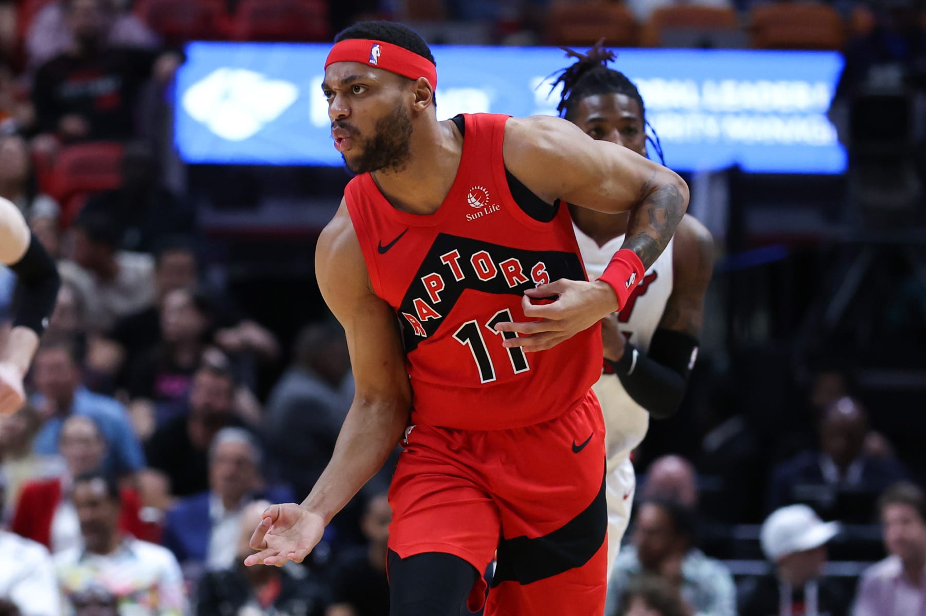 MIAMI, FLORIDA - APRIL 12: Bruce Brown #11 of the Toronto Raptors reacts after making a basket against the Miami Heat during the second quarter of the game at Kaseya Center on April 12, 2024 in Miami, Florida. NOTE TO USER: User expressly acknowledges and agrees that, by downloading and or using this photograph, User is consenting to the terms and conditions of the Getty Images License Agreement. (Photo by Megan Briggs/Getty Images)