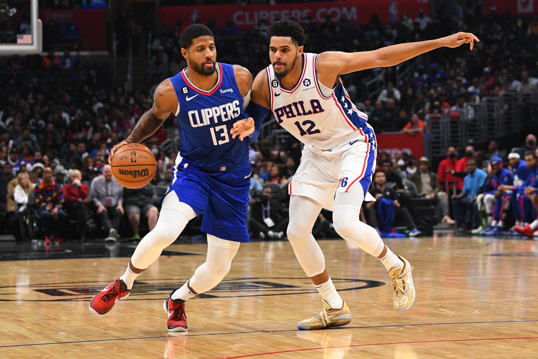 Paul George and Tobias Harris