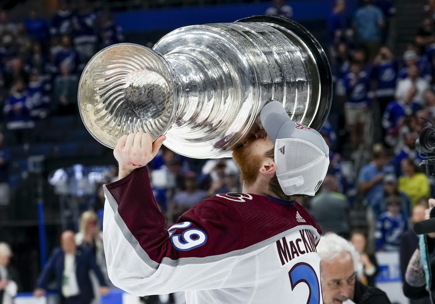 TAMPA, FL - JUNE 26: Colorado Avalanche center Nathan MacKinnon (29) hoisting the Stanley Cup during the NHL Hockey Stanley Cup Finals Game six between Tampa Bay Lightning and the Colorado Avalanche on June 26th, 2022 at Amalie Arena in Tampa Florida (Photo by Andrew Bershaw /Icon_Sportswire)
