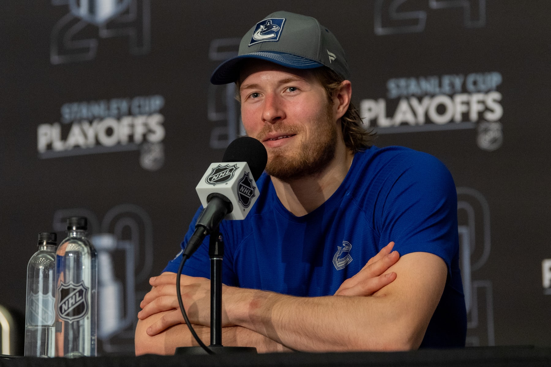 EDMONTON, CANADA - MAY 12: Brock Boeser of the Vancouver Canucks addresses the media after his team's victory over the Edmonton Oilers in Game Three of the Second Round of the 2024 Stanley Cup Playoffs at Rogers Place on May 12, 2024, in Edmonton, Alberta, Canada. (Photo by Andy Devlin/NHLI via Getty Images)