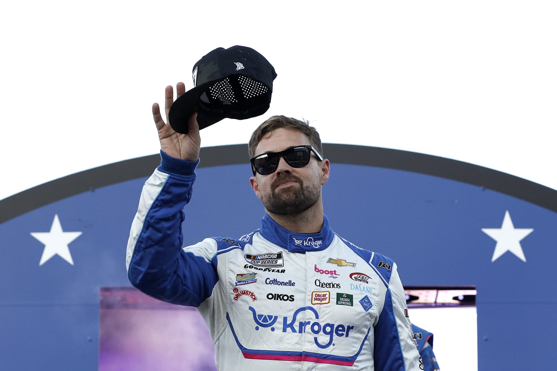 NORTH WILKESBORO, NORTH CAROLINA - MAY 19: Ricky Stenhouse Jr., driver of the #47 Kroger Health/Icy Hot Chevrolet, waves to fans as he walks onstage during driver intros prior to the NASCAR Cup Series All-Star Race at North Wilkesboro Speedway on May 19, 2024 in North Wilkesboro, North Carolina. (Photo by Sean Gardner/Getty Images)