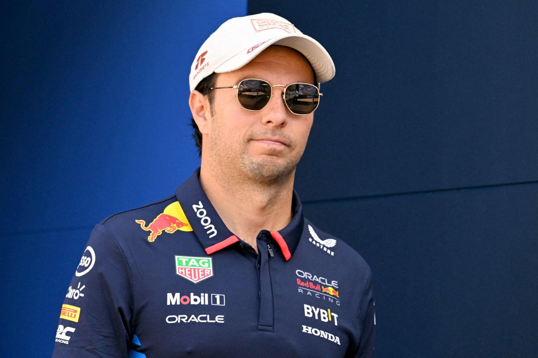 Red Bull Racing's Mexican driver Sergio Perez walks in the paddock ahead of the Formula One Monaco Grand Prix on May 26, 2024 at the Circuit de Monaco. (Photo by NICOLAS TUCAT / AFP) (Photo by NICOLAS TUCAT/AFP via Getty Images)