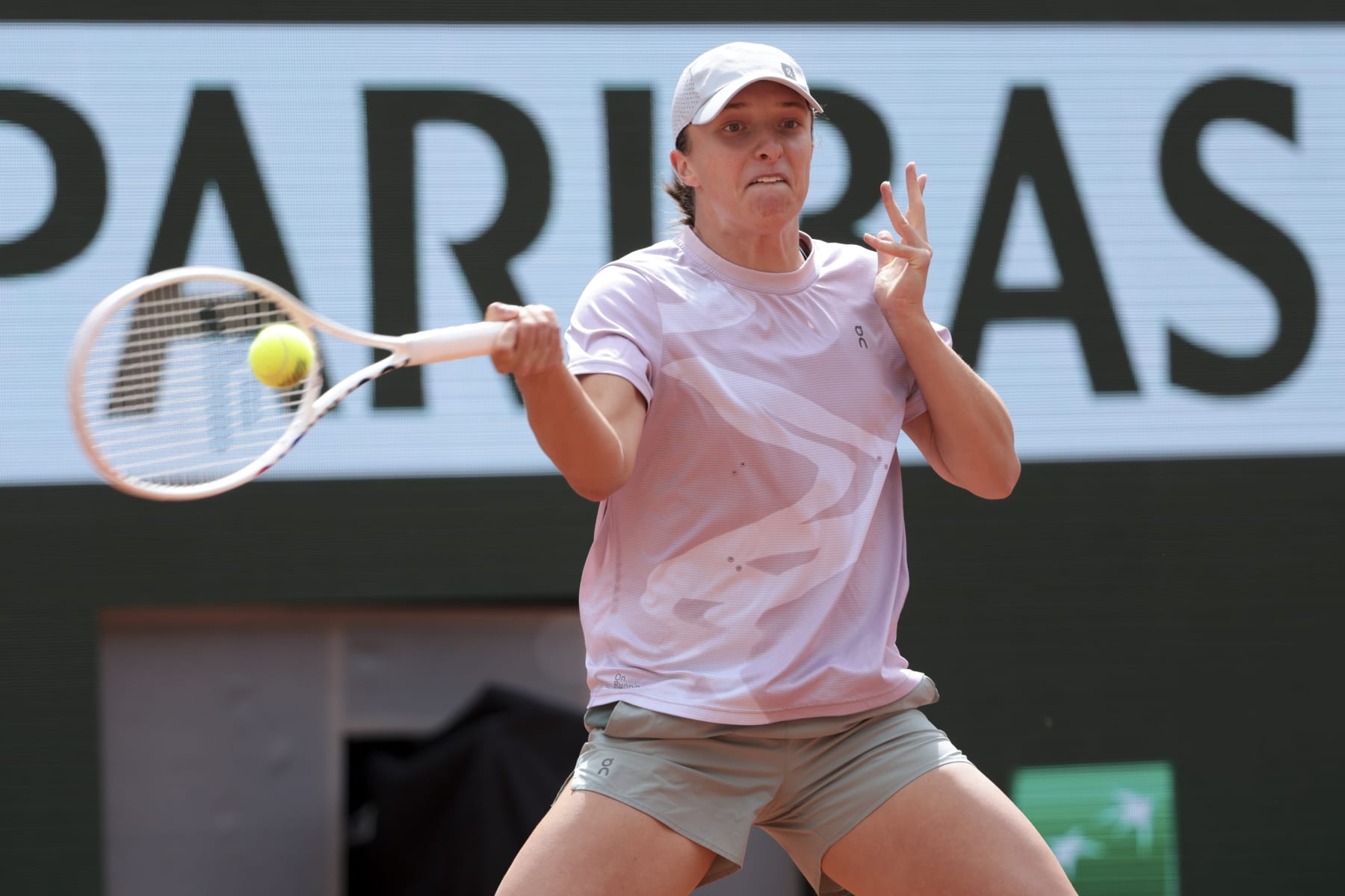 PARIS, FRANCE - MAY 23: Iga Swiatek of Poland practicing ahead of the 2024 French Open, Roland-Garros 2024, Grand Slam tennis tournament at Roland Garros stadium on May 23, 2024 in Paris, France. (Photo by Jean Catuffe/Getty Images)