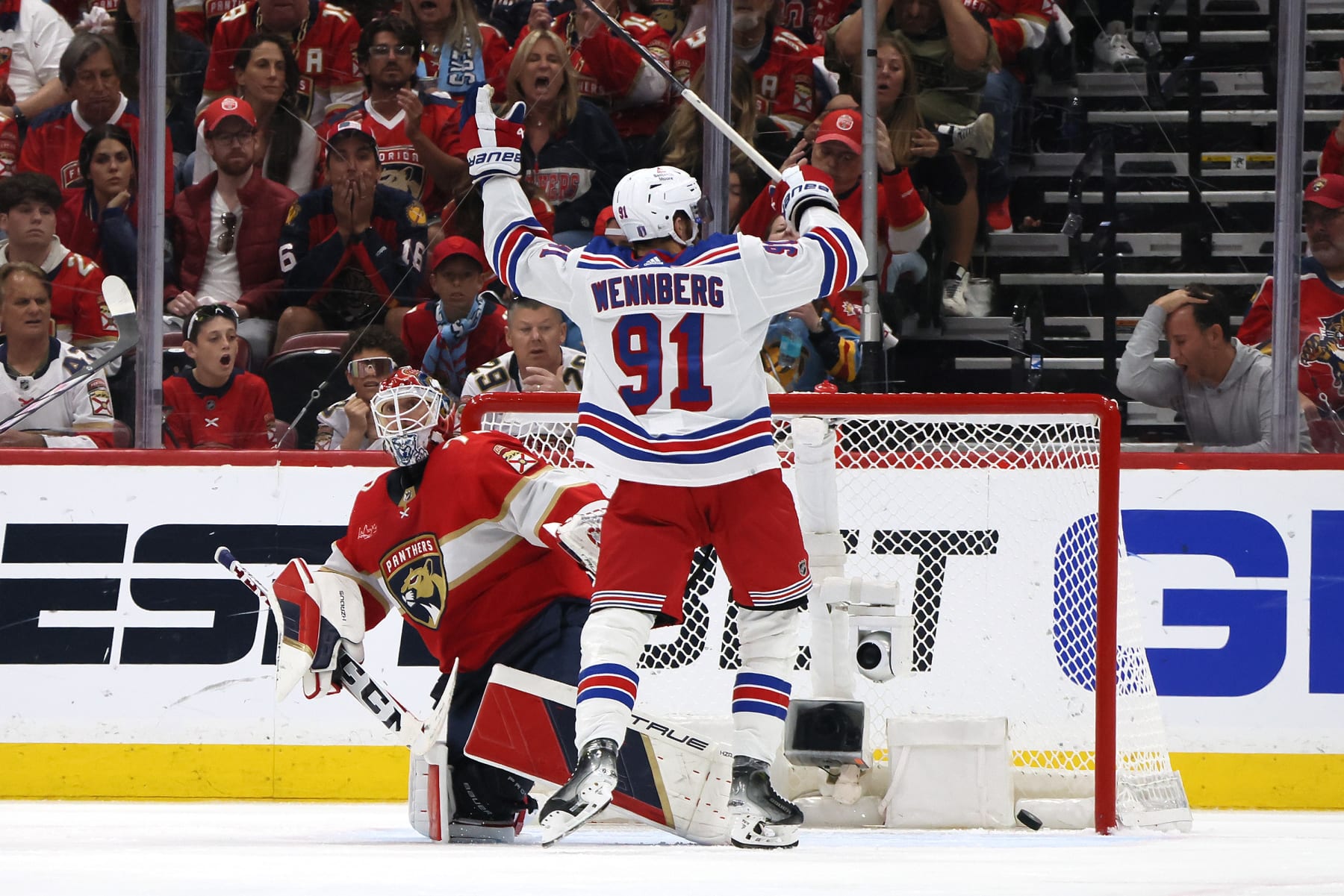 SUNRISE, FLORIDA - MAY 26: Alex Wennberg #91 of the New York Rangers scores the game winning goal against Sergei Bobrovsky #72 of the Florida Panthers during overtime in Game Three of the Eastern Conference Final of the 2024 Stanley Cup Playoffs at Amerant Bank Arena on May 26, 2024 in Sunrise, Florida. (Photo by Bruce Bennett/Getty Images)