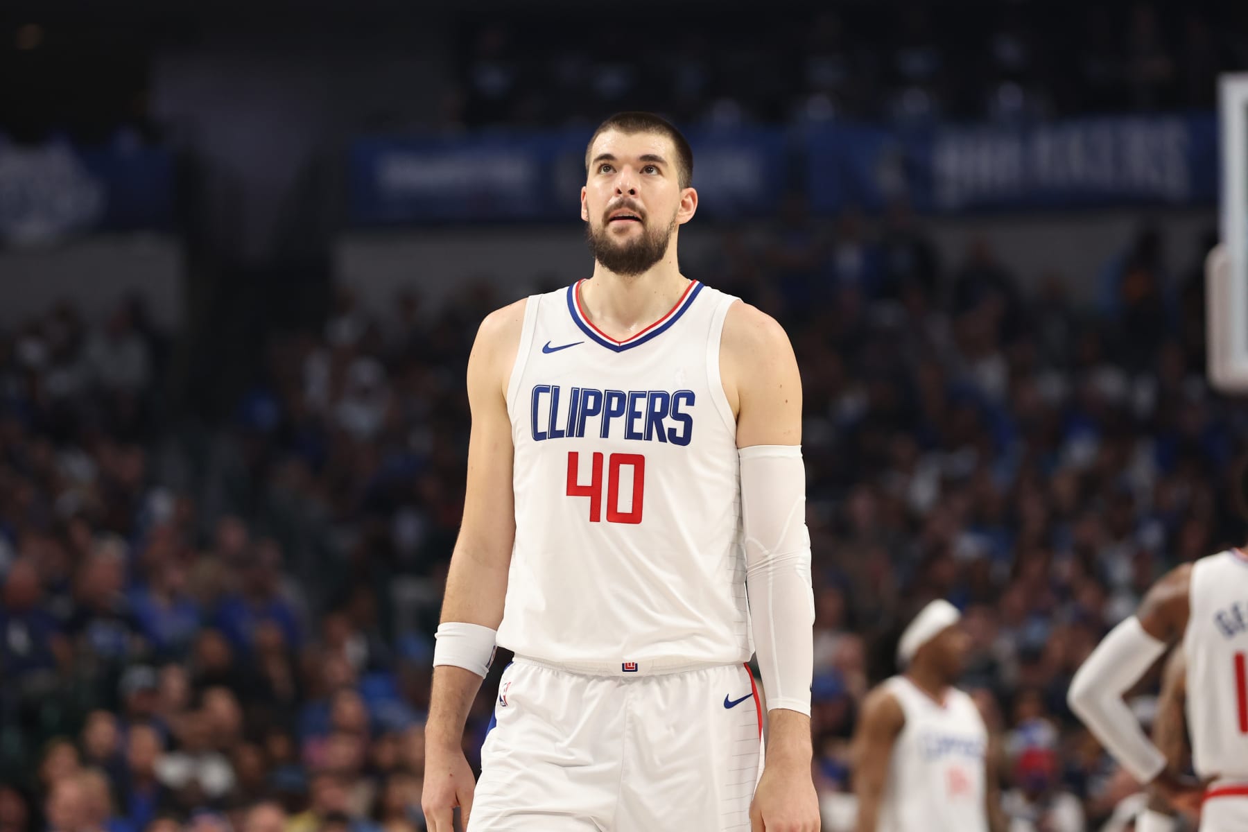 DALLAS, TX - APRIL 28: Ivica Zubac #40 of the LA Clippers looks on during the game against the Dallas Mavericks during Round 1 Game 4 of the 2024 NBA Playoffs on April 28, 2024 at the American Airlines Center in Dallas, Texas. NOTE TO USER: User expressly acknowledges and agrees that, by downloading and or using this photograph, User is consenting to the terms and conditions of the Getty Images License Agreement. Mandatory Copyright Notice: Copyright 2024 NBAE (Photo by Tim Heitman/NBAE via Getty Images)