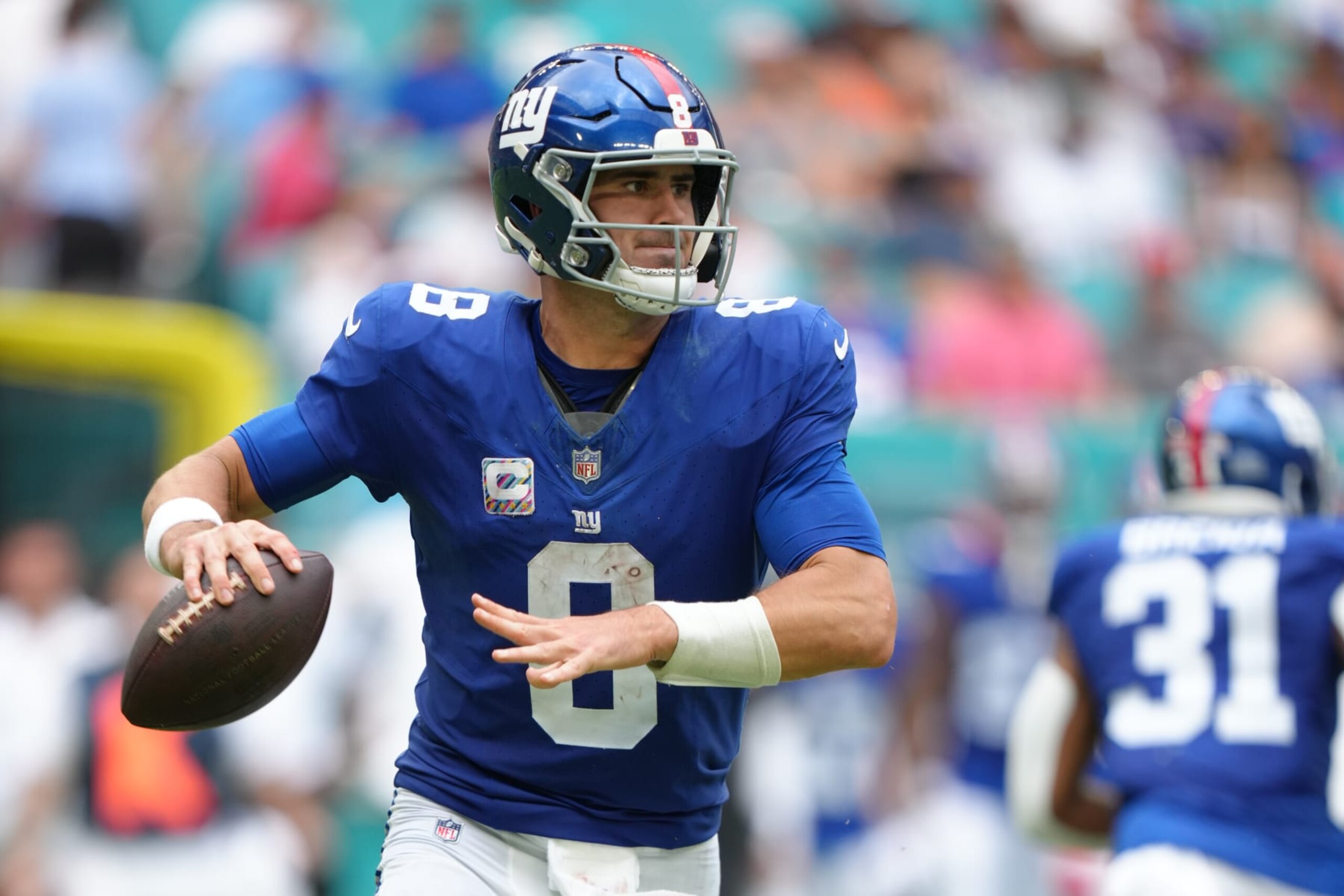 MIAMI GARDENS, FL - OCTOBER 08: New York Giants quarterback Daniel Jones (8)makes a pass attempt during the game between the New York Giants and the Miami Dolphins on Sunday, October 8, 2023 at Hard Rock Stadium, Miami Gardens, Fla. (Photo by Peter Joneleit/Icon Sportswire via Getty Images)
