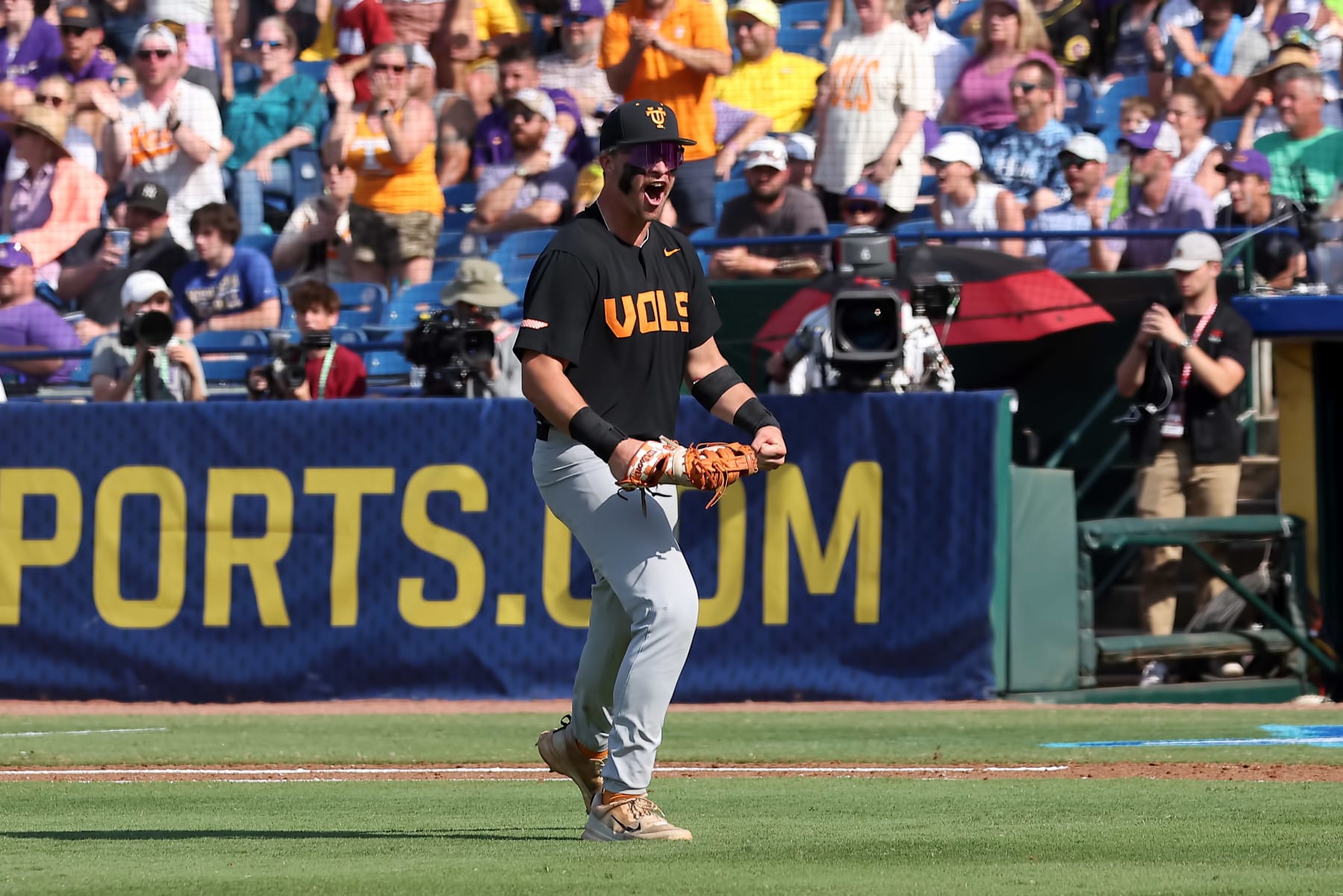 HOOVER, AL - MAY 26: Tennessee Volunteers first baseman Blake Burke (25) celebrates a successful pick off attempt during the 2024 SEC Baseball Tournament championship game between the Tennessee Volunteers and the LSU Tigers on May 26, 2024 at the Hoover Metropolitan Stadium in Hoover, Alabama. (Photo by Michael Wade/Icon Sportswire via Getty Images)