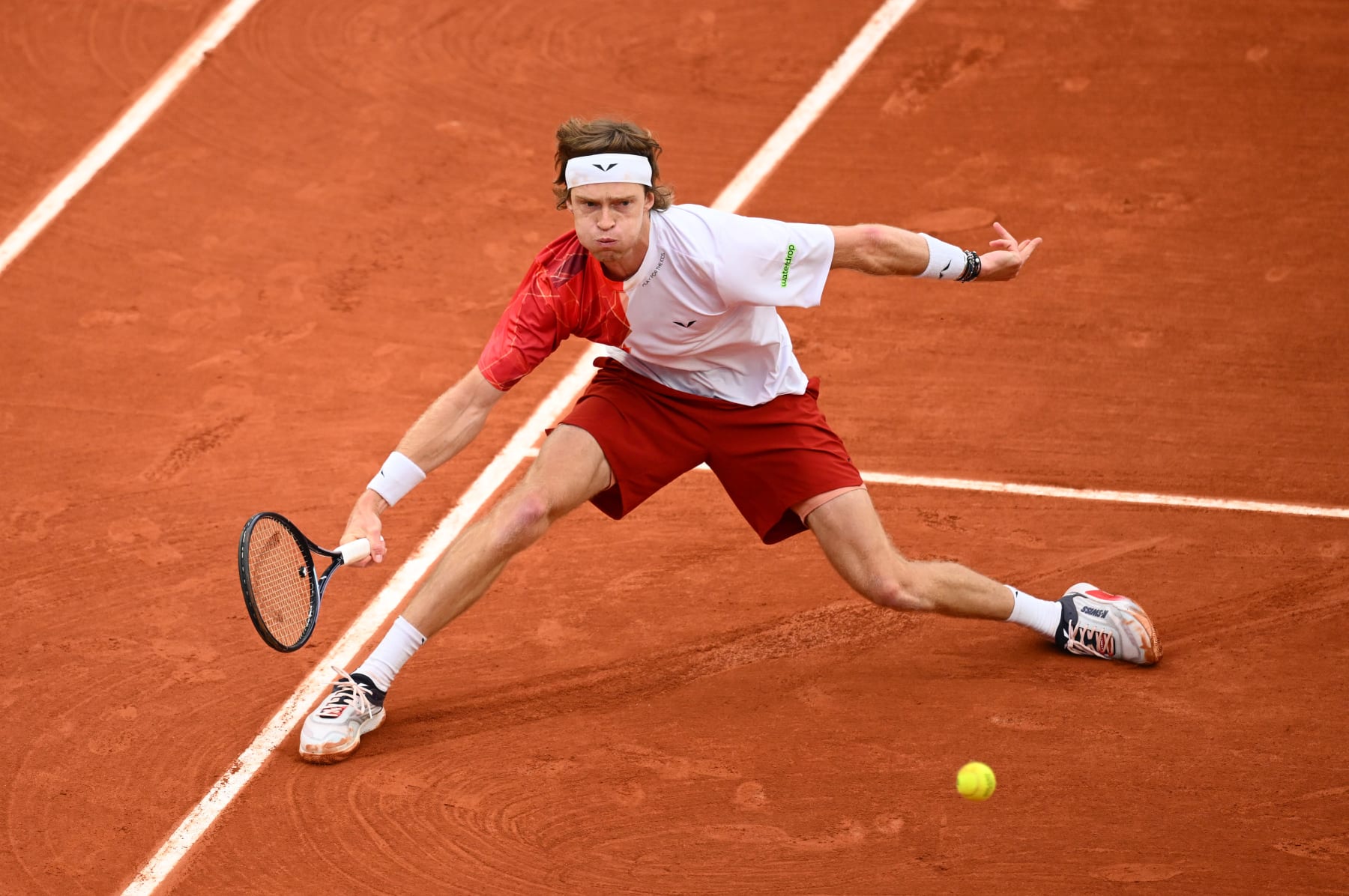 PARIS, FRANCE - MAY 29: Andrey Rublev plays a forehand against Pedro Martinez of Spain in the Men's Singles second round match during Day Four of the 2024 French Open at Roland Garros on May 29, 2024 in Paris, France. (Photo by Clive Mason/Getty Images)