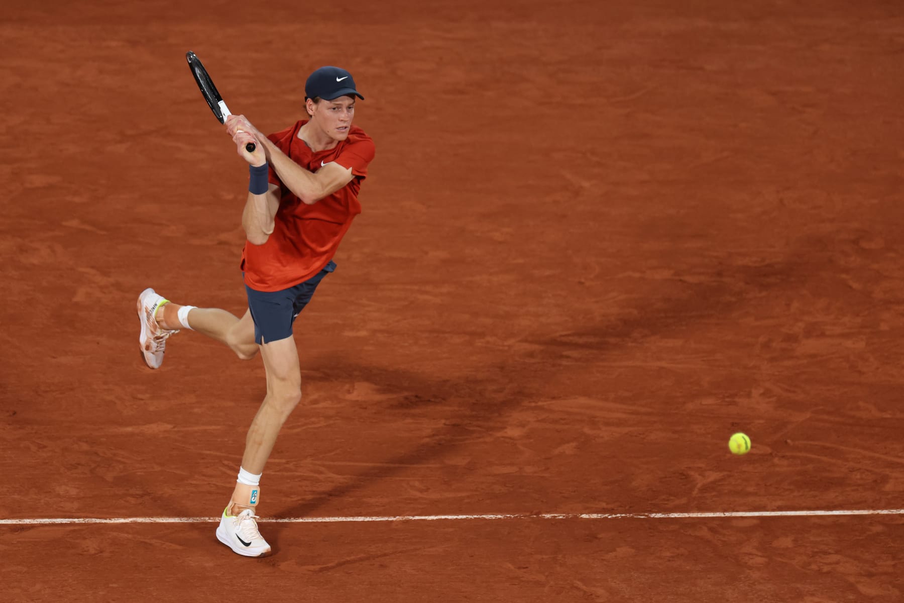 PARIS, FRANCE - MAY 29: Jannik Sinner of Italy plays a backhand against Richard Gasquet of France in the Men's Singles second round match during Day Four of the 2024 French Open at Roland Garros on May 29, 2024 in Paris, France. (Photo by Dan Istitene/Getty Images)