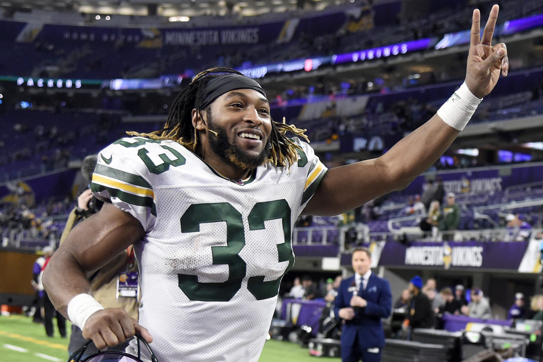 MINNEAPOLIS, MINNESOTA - DECEMBER 23: Running back Aaron Jones #33 of the Green Bay Packers walks off the field after the  23-10 win over the Minnesota Vikings at U.S. Bank Stadium on December 23, 2019 in Minneapolis, Minnesota. (Photo by Hannah Foslien/Getty Images)