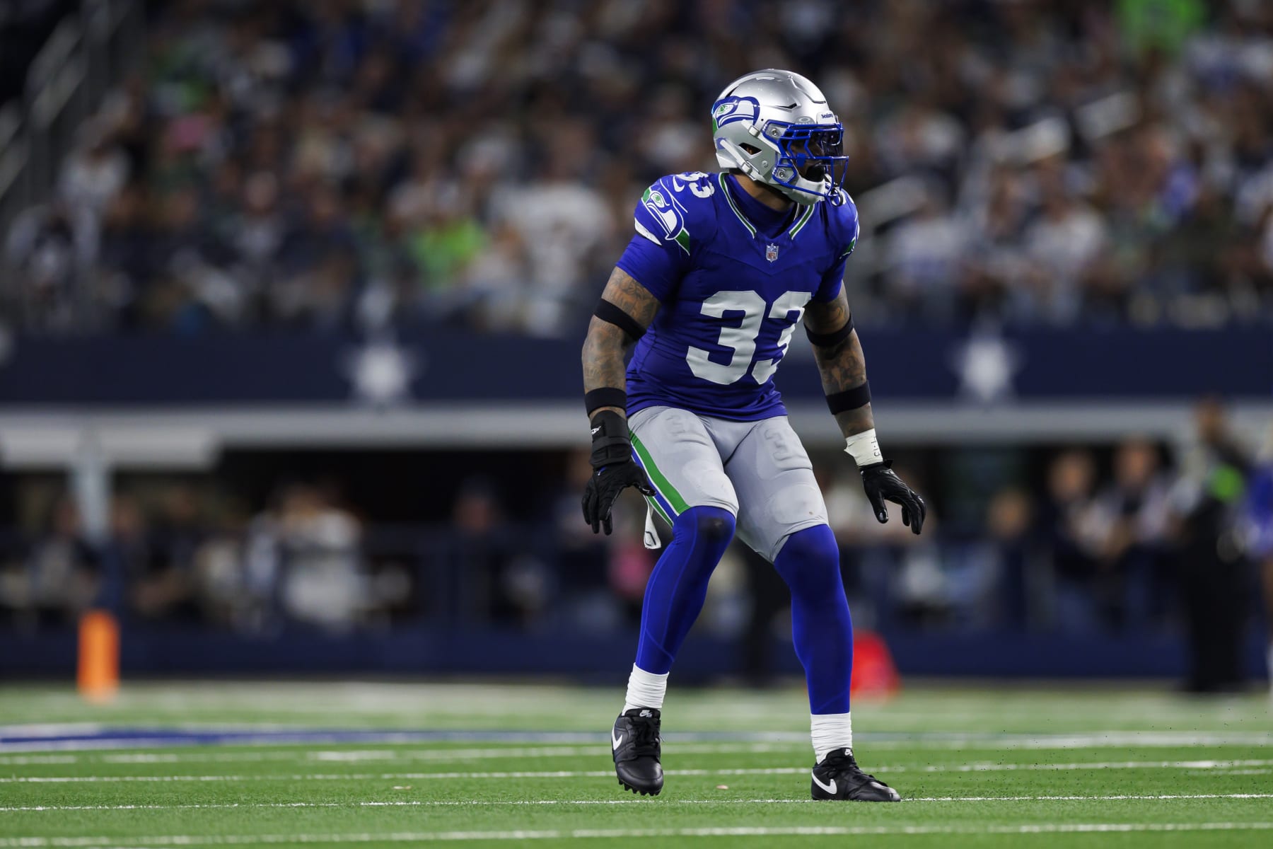ARLINGTON, TEXAS - NOVEMBER 30: Jamal Adams #33 of the Seattle Seahawks defends in coverage during an NFL football game against the Dallas Cowboys at AT&T Stadium on November 30, 2023 in Arlington, Texas. (Photo by Ryan Kang/Getty Images)