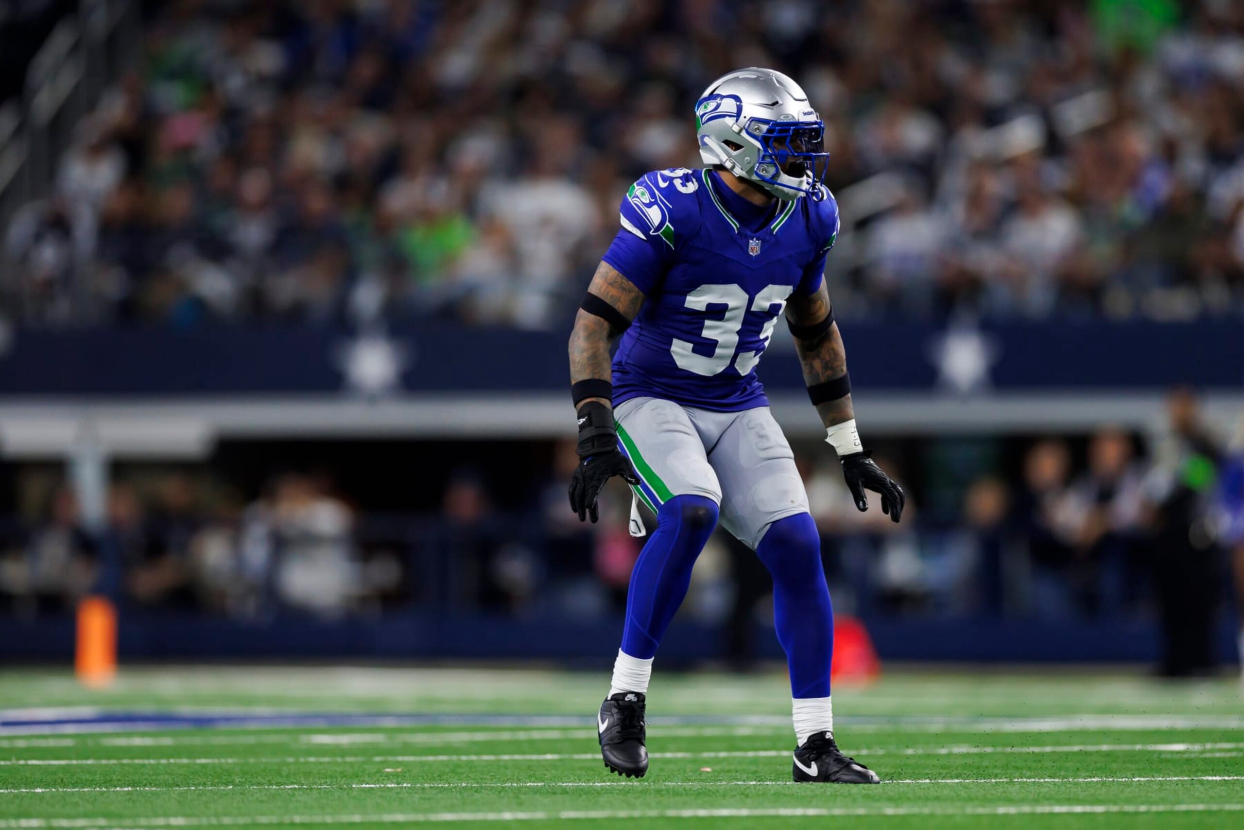 ARLINGTON, TEXAS - NOVEMBER 30: Jamal Adams #33 of the Seattle Seahawks defends in coverage during an NFL football game against the Dallas Cowboys at AT&T Stadium on November 30, 2023 in Arlington, Texas. (Photo by Ryan Kang/Getty Images)