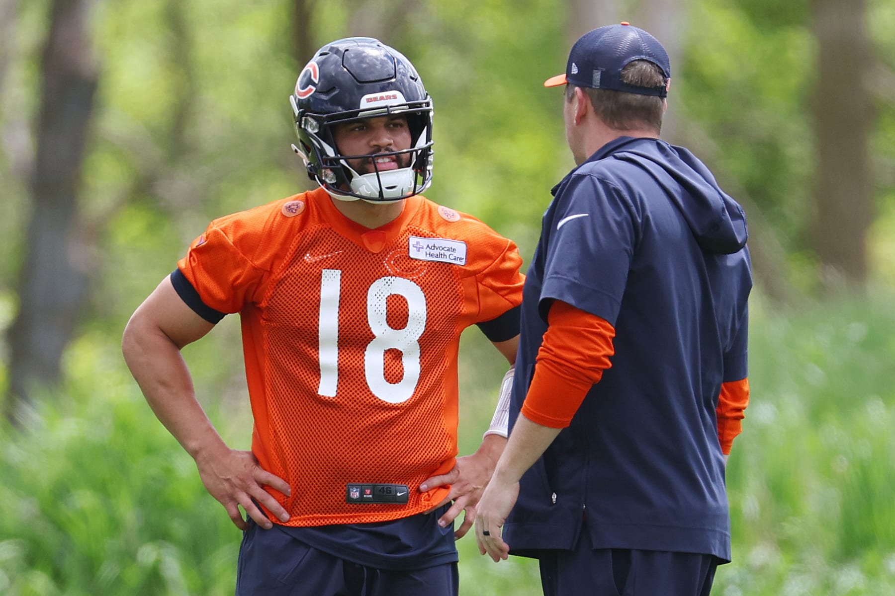 LAKE FOREST, ILLINOIS - MAY 10: Offensive coordinator Shane Waldron of the Chicago Bears talks with Caleb Williams #18 during Chicago Bears Rookie Minicamp at Halas Hall on May 10, 2024 in Lake Forest, Illinois. (Photo by Michael Reaves/Getty Images)