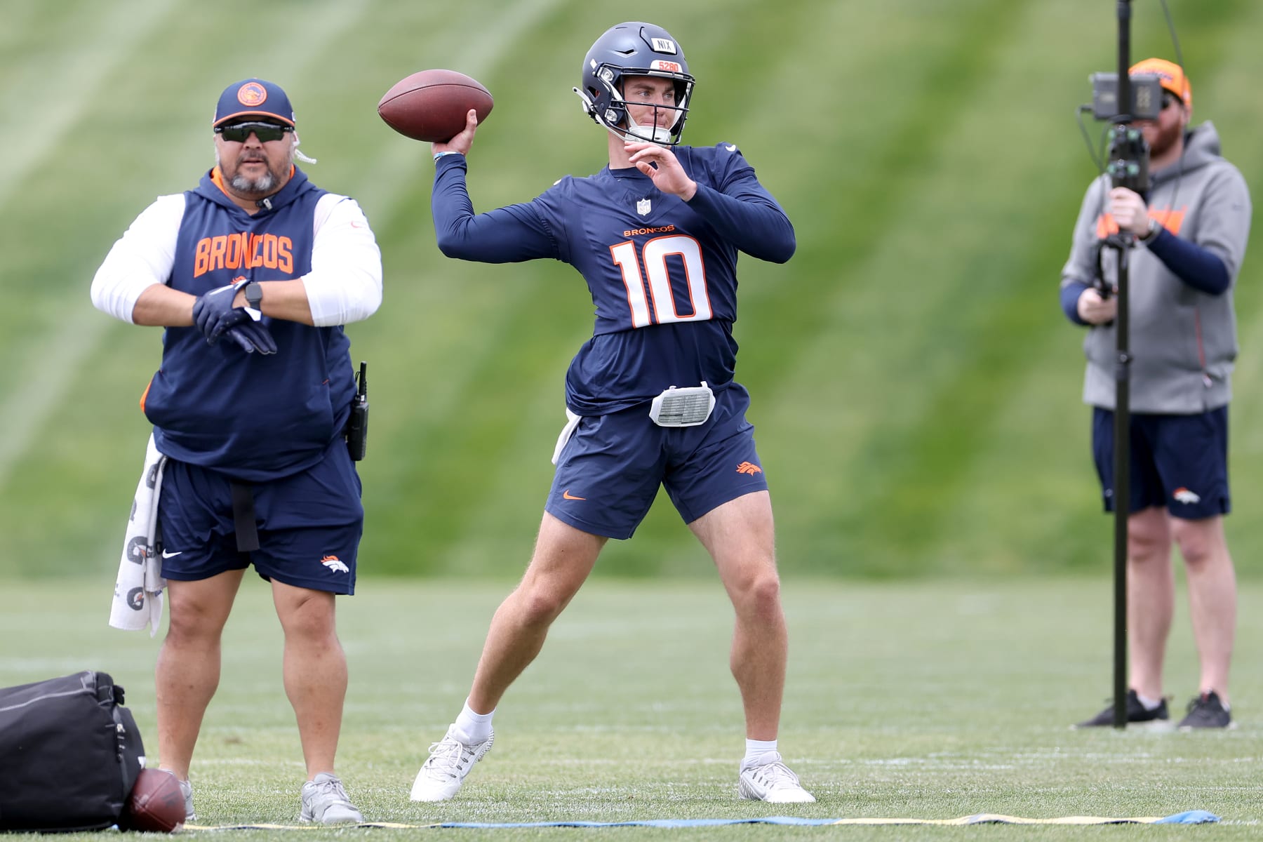 ENGLEWOOD, COLORADO - MAY 11: Quarterback Bo Nix #10 of the Denver Broncos throws during Denver Broncos Rookie Minicamp at Centura Health Training Center on May 11, 2024 in Englewood, Colorado. (Photo by Matthew Stockman/Getty Images)
