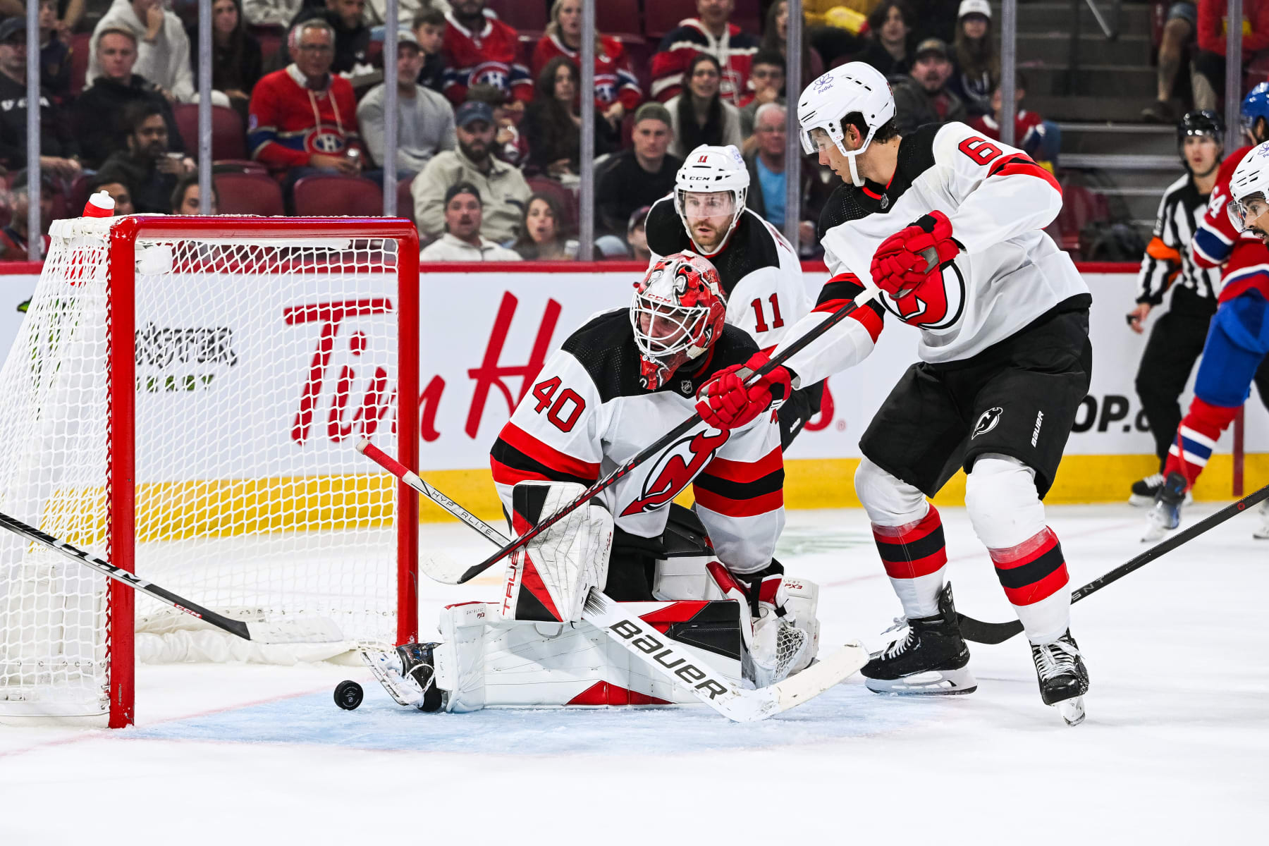 MONTREAL, QC - SEPTEMBER 25: New Jersey Devils goalie Akira Schmid (40) allows a goal to Montreal Canadiens right wing Josh Anderson (17) (not pictured) during the New Jersey Devils versus the Montreal Canadiens preseason game on September 25, 2023, at Bell Centre in Montreal, QC (Photo by David Kirouac/Icon Sportswire via Getty Images)