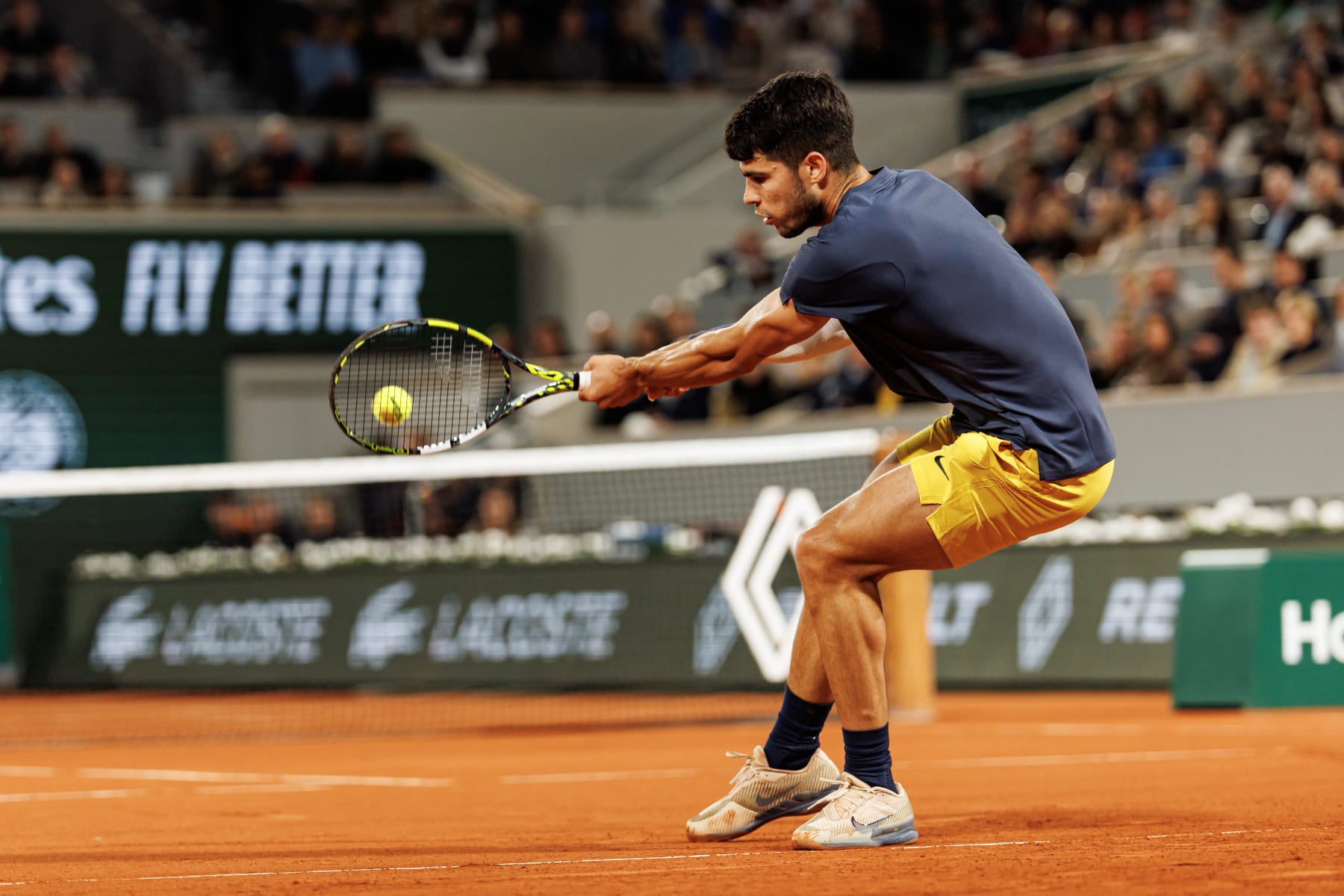 PARIS, FRANCE - MAY 31: Carlos Alcaraz of Spain hits a backhand against Sebastian Korda of the United States in the third round of the men's singles at Roland Garros on May 31, 2024 in Paris, France. (Photo by Frey/TPN/Getty Images)