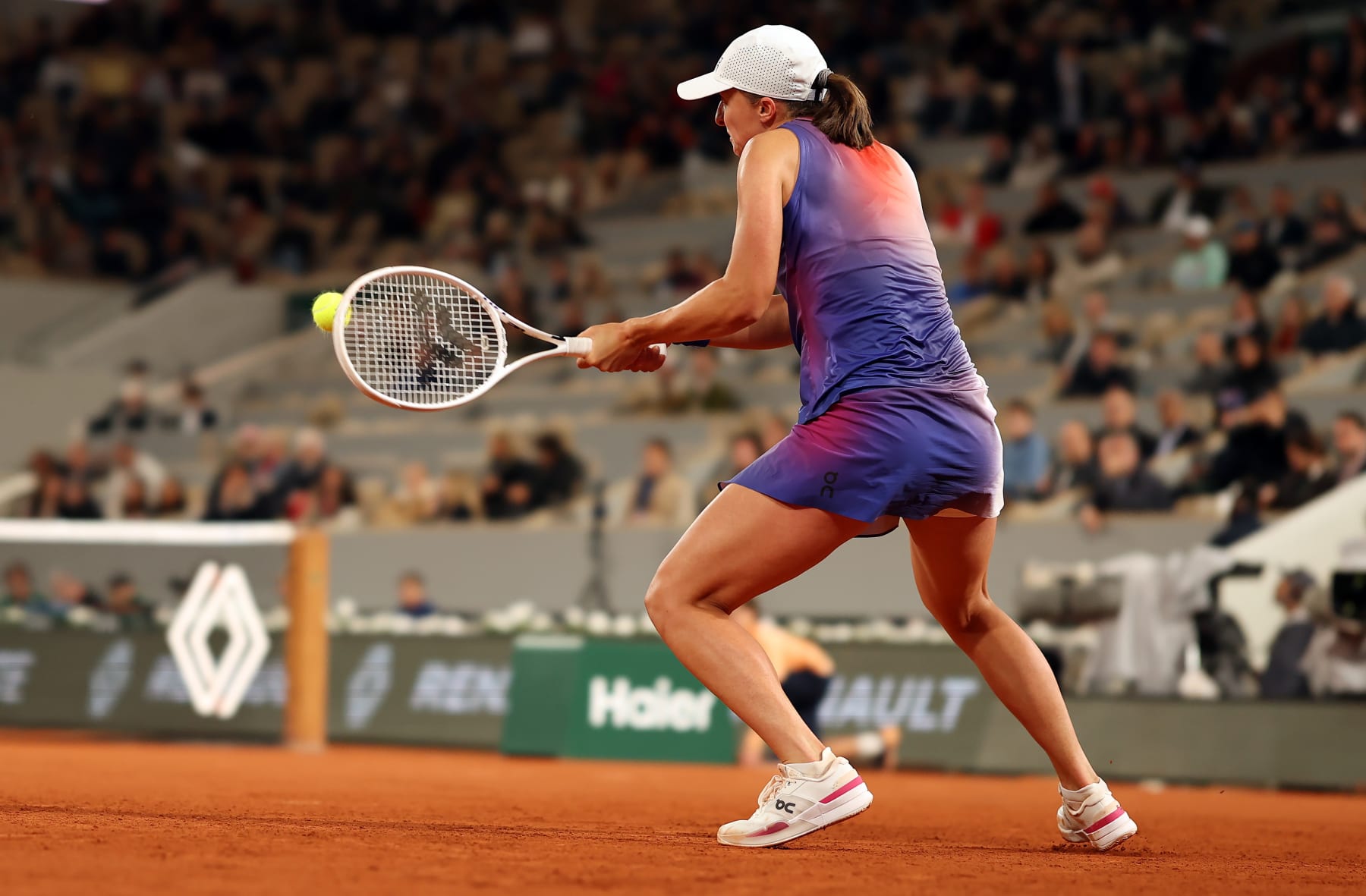 PARIS, FRANCE - MAY 31: Iga Swiatek of Poland is seen in action against Marie Bouzkova of Czech Republic during the third round of the 2024 French Open at Roland Garros on May 31, 2024 in Paris, France. (Photo by Ian MacNicol/Getty Images)