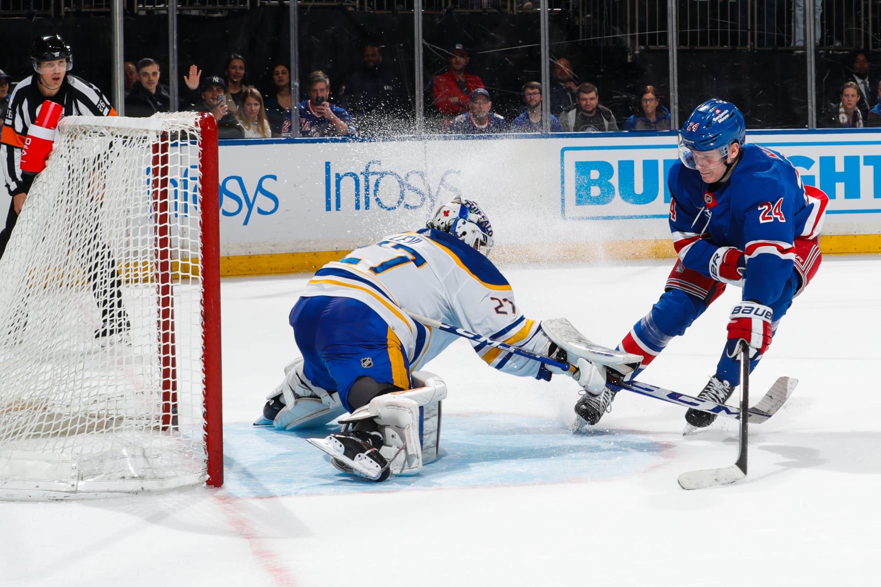 NEW YORK, NEW YORK - APRIL 10: Devon Levi #27 of the Buffalo Sabres makes a save against Kaapo Kakko #24 of the New York Rangers to win in the shootout at Madison Square Garden on April 10, 2023 in New York City. (Photo by Jared Silber/NHLI via Getty Images)