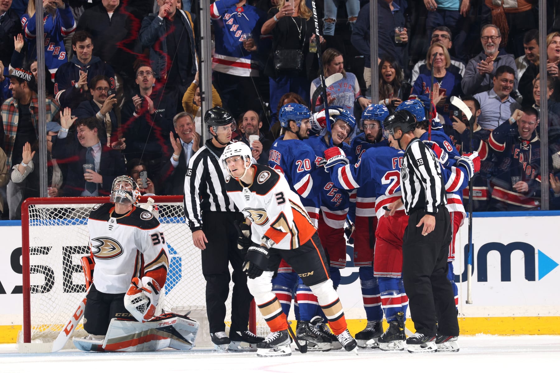 NEW YORK, NEW YORK - OCTOBER 17: Kaapo Kakko #24 of the New York Rangers celebrates with teammates after scoring a goal in the second period against the Anaheim Ducks at Madison Square Garden on October 17, 2022 in New York City. (Photo by Jared Silber/NHLI via Getty Images)