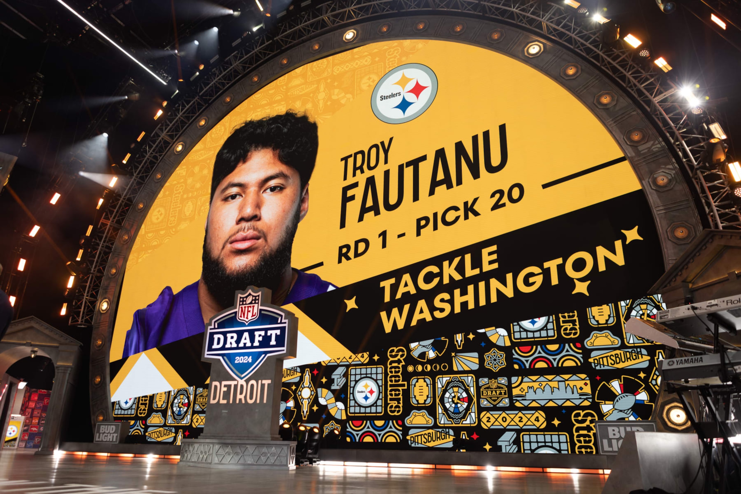 DETROIT, MI - APRIL 25: Washington Tackle Troy Fautanu is taken by the Pittsburgh Steelers with the 20th overall pick during Day 1 of the NFL Draft on April 25, 2024 at Campus Martius Park and Hart Plaza in Detroit, MI. (Photo by John Smolek/Icon Sportswire via Getty Images) DETROIT, MI - APRIL 25: Washington Tackle Troy Fautanu is taken by the Pittsburgh Steelers with the 20th overall pick during Day 1 of the NFL Draft on April 25, 2024 at Campus Martius Park and Hart Plaza in Detroit, MI. (Photo by John Smolek/Icon Sportswire via Getty Images)