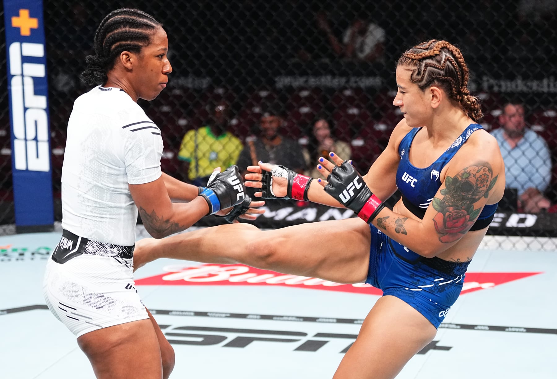 NEWARK, NEW JERSEY - JUNE 01: (R-L) Ailin Perez of Argentina kicks Joselyne Edwards of Panama in a bantamweight fight during the UFC 302 event at Prudential Center on June 01, 2024 in Newark, New Jersey. (Photo by Jeff Bottari/Zuffa LLC via Getty Images)