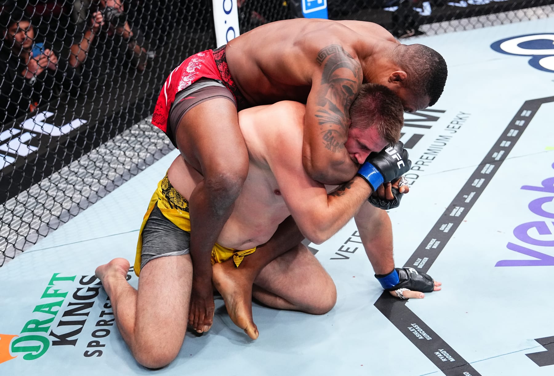 NEWARK, NEW JERSEY - JUNE 01: (L-R) Jailton Almeida of Brazil works for a submission against Alexandr Romanov of Moldova in a heavyweight fight during the UFC 302 event at Prudential Center on June 01, 2024 in Newark, New Jersey. (Photo by Jeff Bottari/Zuffa LLC via Getty Images)