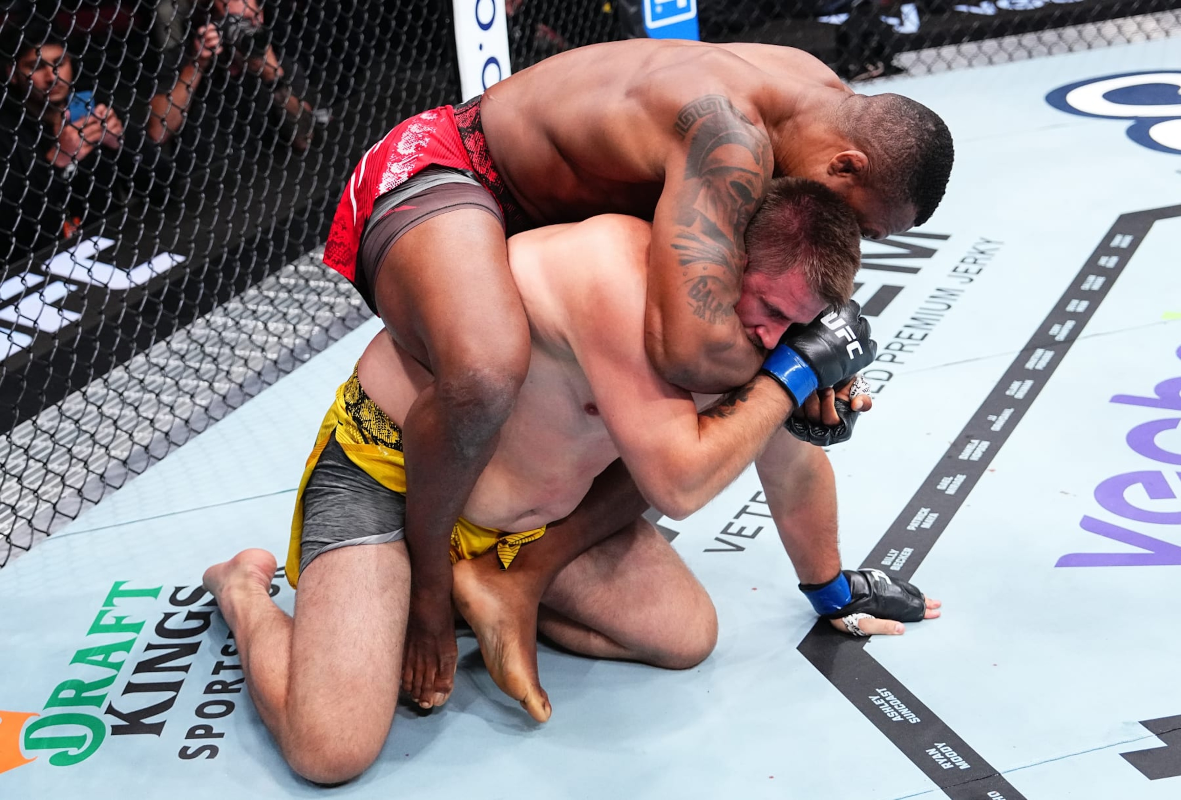 NEWARK, NEW JERSEY - JUNE 01: (L-R) Jailton Almeida of Brazil works for a submission against Alexandr Romanov of Moldova in a heavyweight fight during the UFC 302 event at Prudential Center on June 01, 2024 in Newark, New Jersey. (Photo by Jeff Bottari/Zuffa LLC via Getty Images)