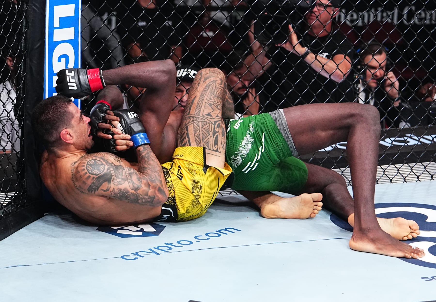 NEWARK, NEW JERSEY - JUNE 01: (L-R) Elizeu Zaleski dos Santos of Brazil works for a submission against Randy Brown of Jamaica in a welterweight fight during the UFC 302 event at Prudential Center on June 01, 2024 in Newark, New Jersey. (Photo by Jeff Bottari/Zuffa LLC via Getty Images)