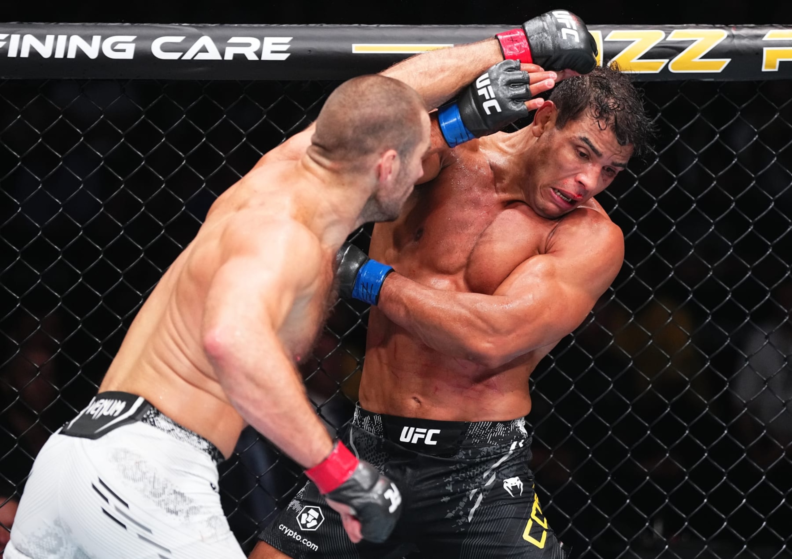 NEWARK, NEW JERSEY - JUNE 01: (L-R) Sean Strickland punches Paulo Costa of Brazil in a middleweight fight during the UFC 302 event at Prudential Center on June 01, 2024 in Newark, New Jersey. (Photo by Jeff Bottari/Zuffa LLC via Getty Images)