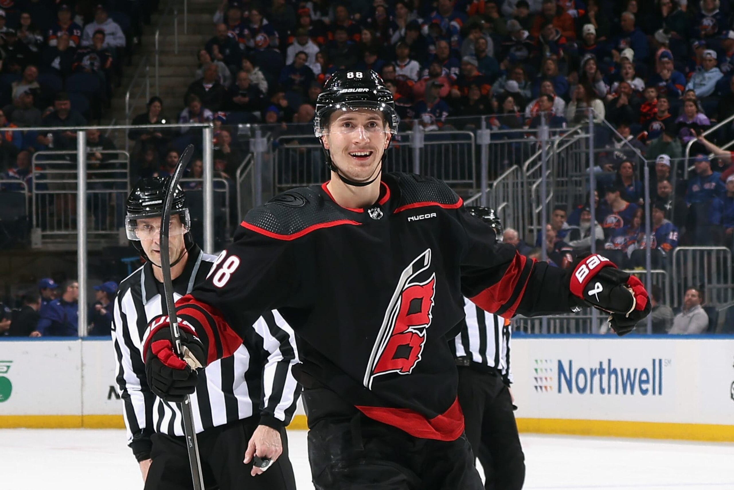 ELMONT, NEW YORK - MARCH 19: Martin Necas #88 of the Carolina Hurricanes celebrates his goal at 19:59 of the first period against the New York Islanders at UBS Arena on March 19, 2024 in Elmont, New York. (Photo by Bruce Bennett/Getty Images)