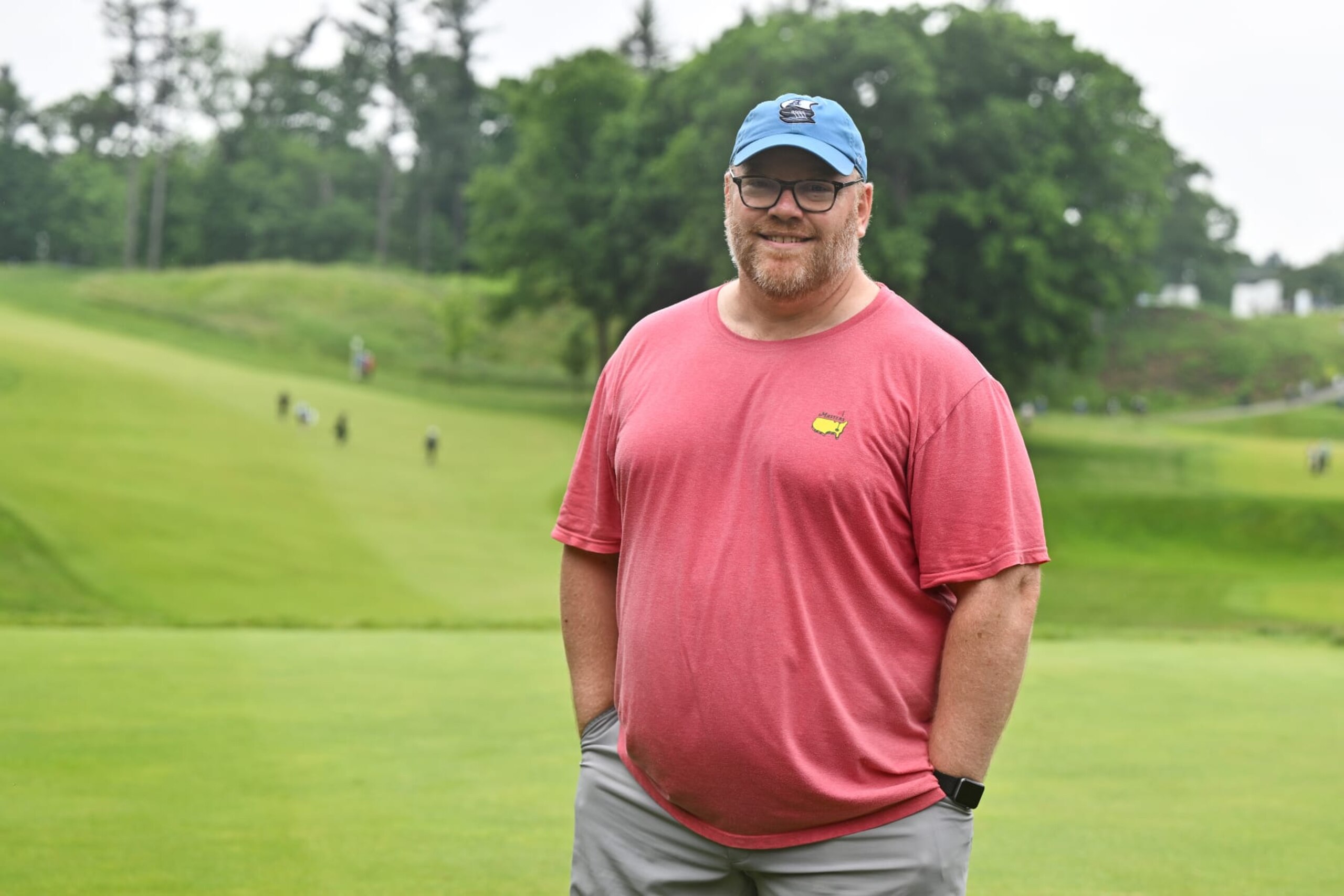 HAMILTON, ONTARIO - JUNE 02: Paul Emerson, a fan, smiles for a photo after having caddied for C.T. Pan of Taiwan for a portion of the final round of the RBC Canadian Open at Hamilton Golf & Country Club on June 02, 2024 in Hamilton, Ontario, Canada. (Photo by Minas Panagiotakis/Getty Images)