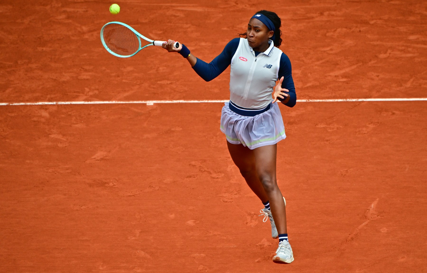 PARIS, FRANCE - JUNE 02: Coco Gauff of United States serves against Elisabetta Cocciaretto of Italy in the Women's Singles fourth round match during Day Eight of the 2024 French Open at Roland Garros on June 02, 2024 in Paris, (Photo by Christian Liewig - Corbis/Getty Images)